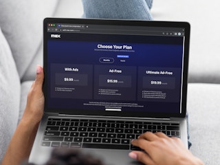 Someone looking at the plans for subscribing to Max streaming service