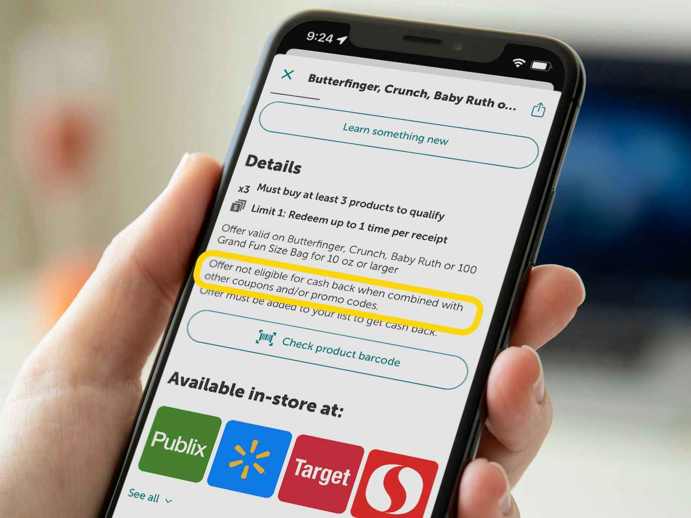 A close up on an offer in the ibotta app displayed on a cellphone with a yellow box around text that reads, "Offer not eligible for cash back when combined with other coupons and/or promo codes