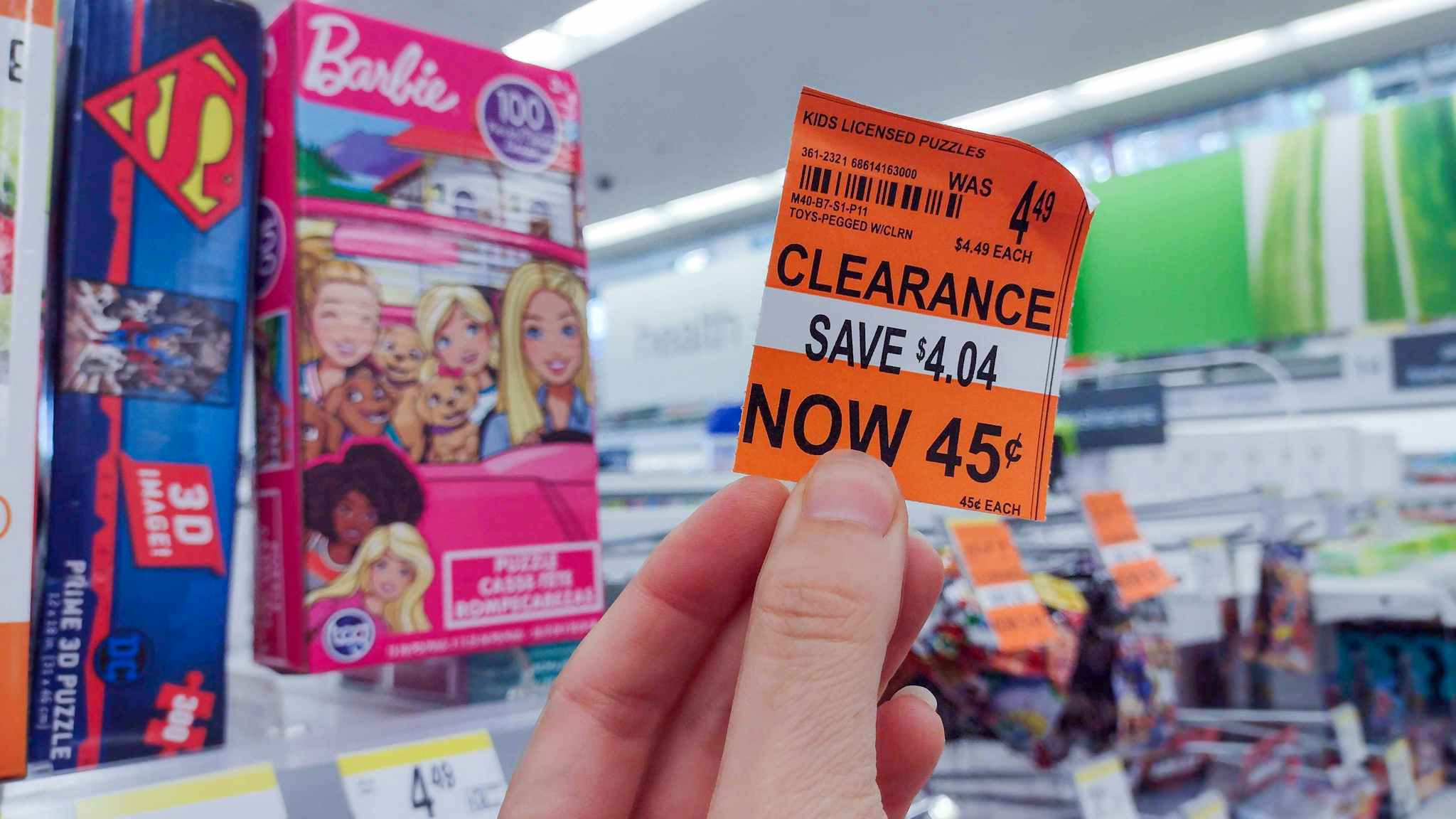 hand holding walgreens clearance tag