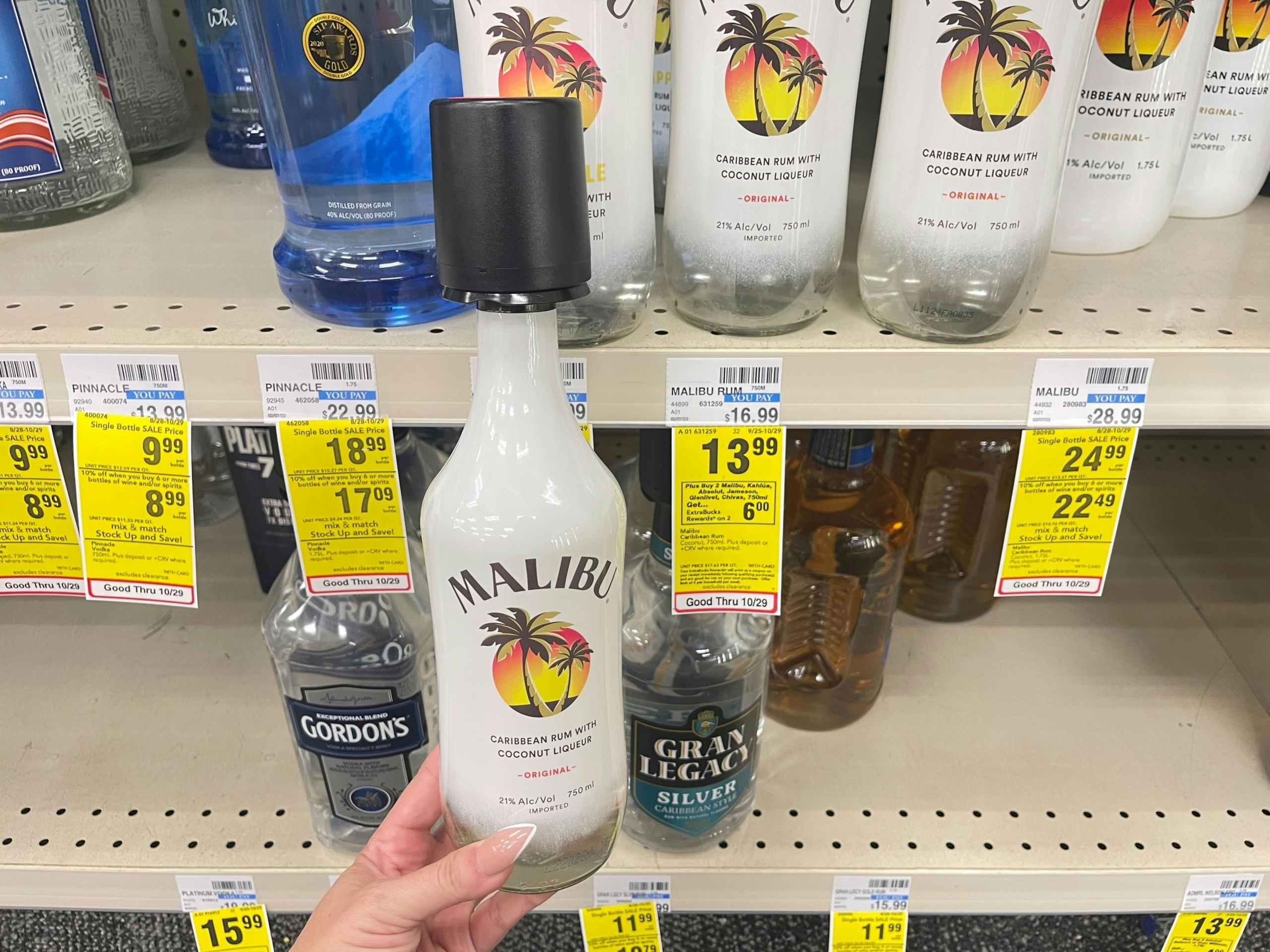 750ml bottle of malibu rum next to $13.99 sales tag at CVS