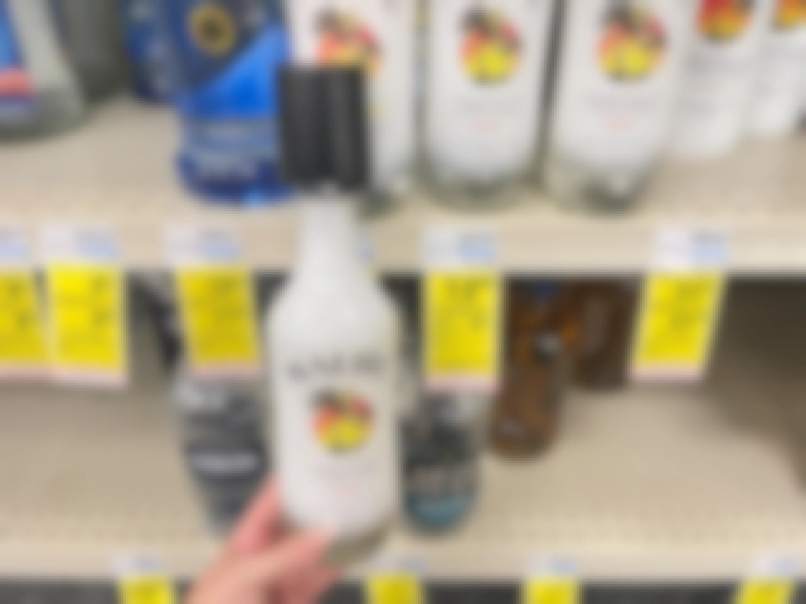 750ml bottle of malibu rum next to $13.99 sales tag at CVS