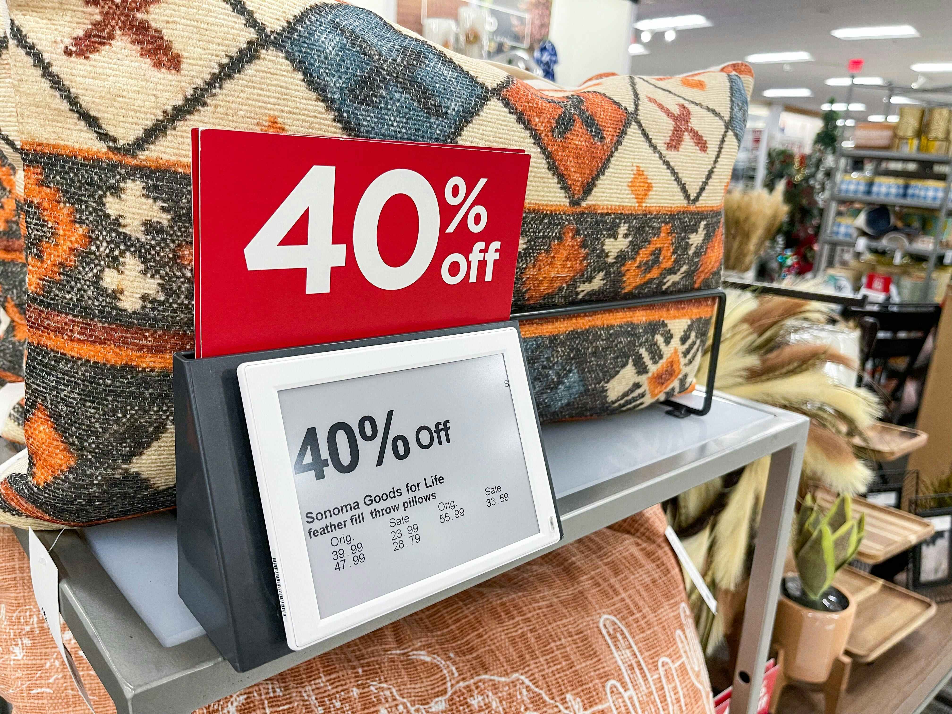 A Kohl's in-store display of farmhouse decor with signage showing it to be 40% off