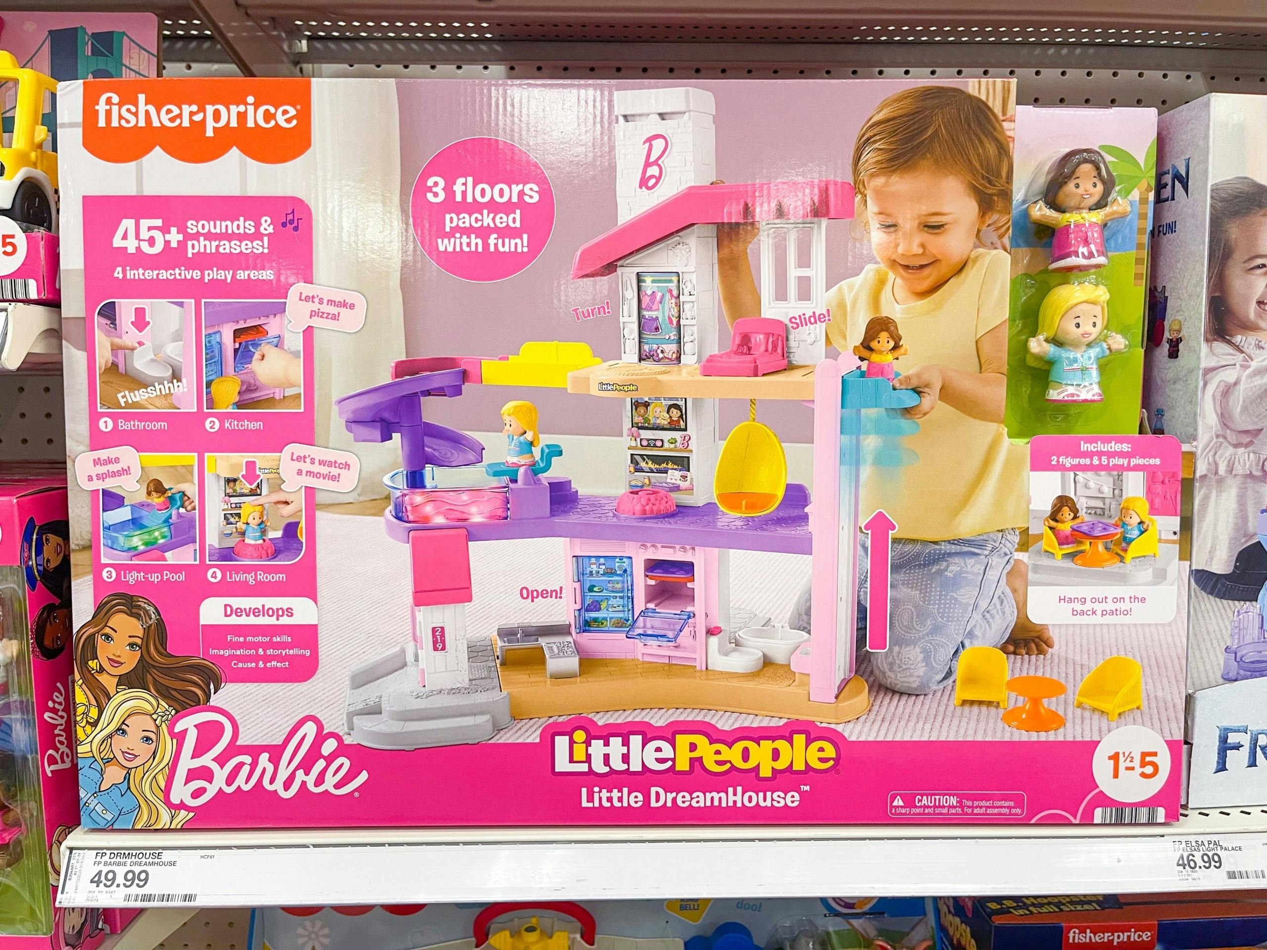 fisher price little people barbie dreamhouse sitting on shelf