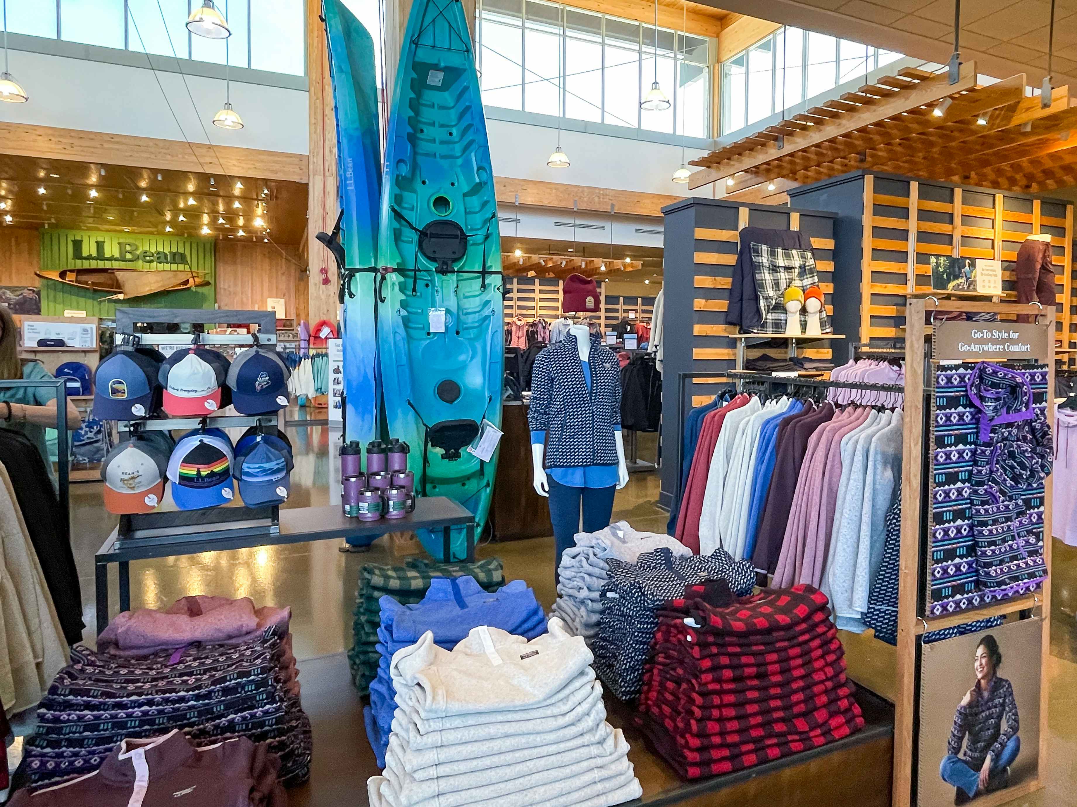 The inside of an L.L.Bean store showing products on display.