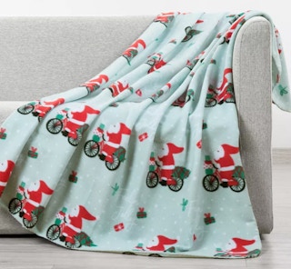 Screen shot of lifestyle image of holiday or christmas fleece blanket