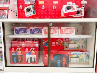 nintendo switch consoles on shelves at target