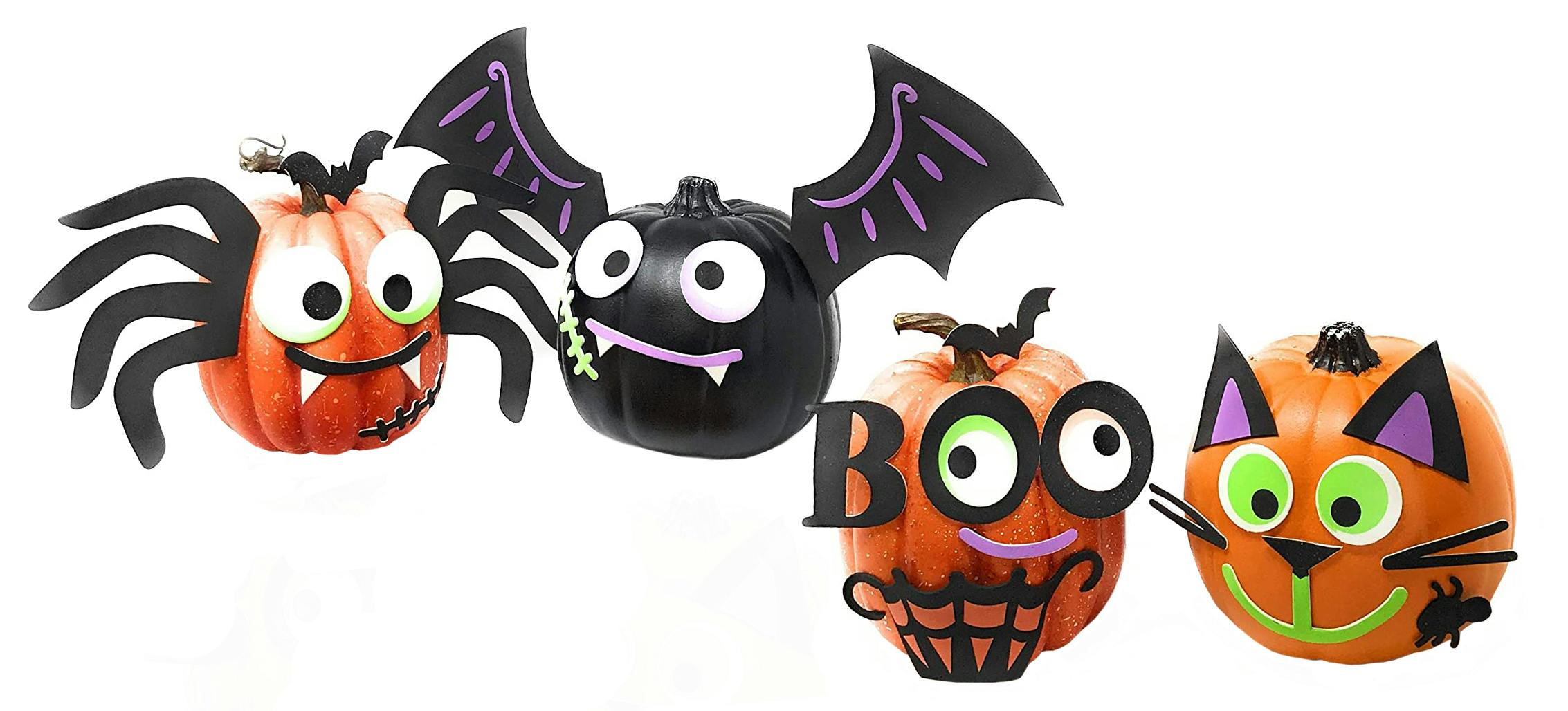 four no-carve pumpkins with foam decorations