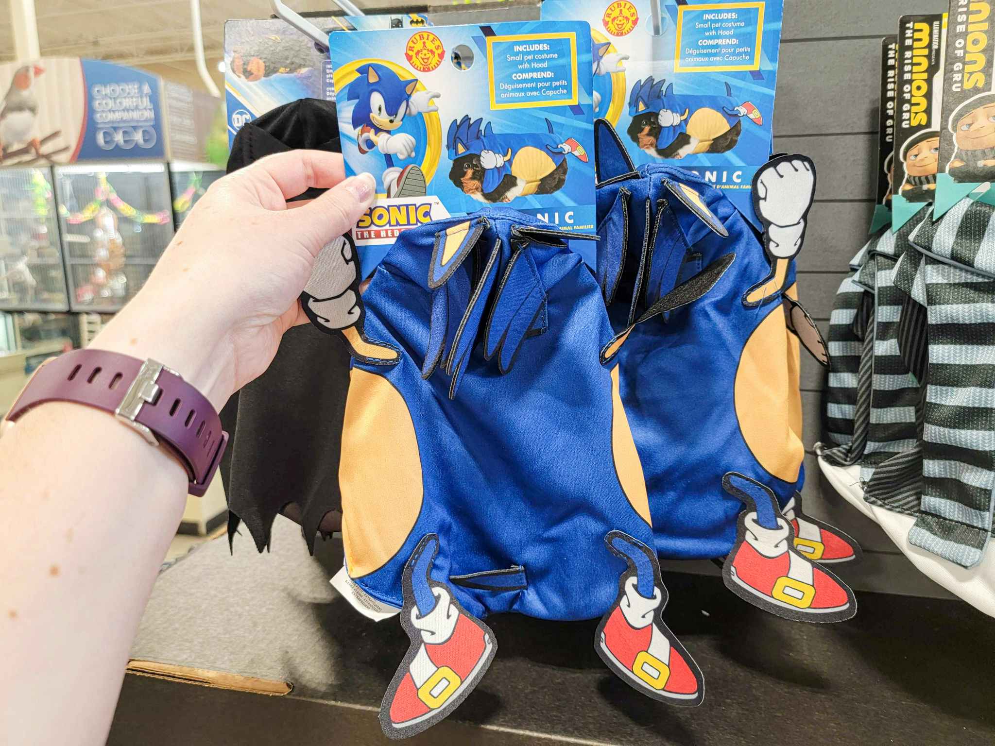 hand holding a sonic the hedgehog costume for small pets