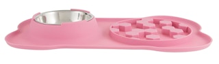 a pink silicone feeder mat with a puzzle feeder and a dog bowl