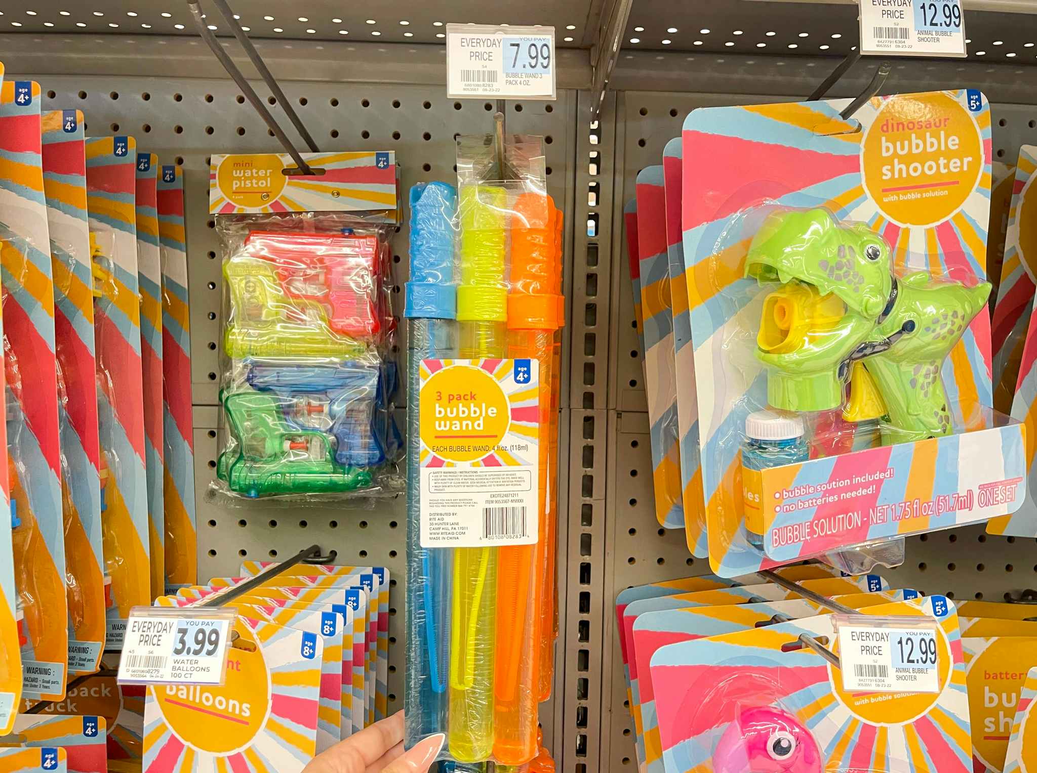 hand holding bubble wands under price tag