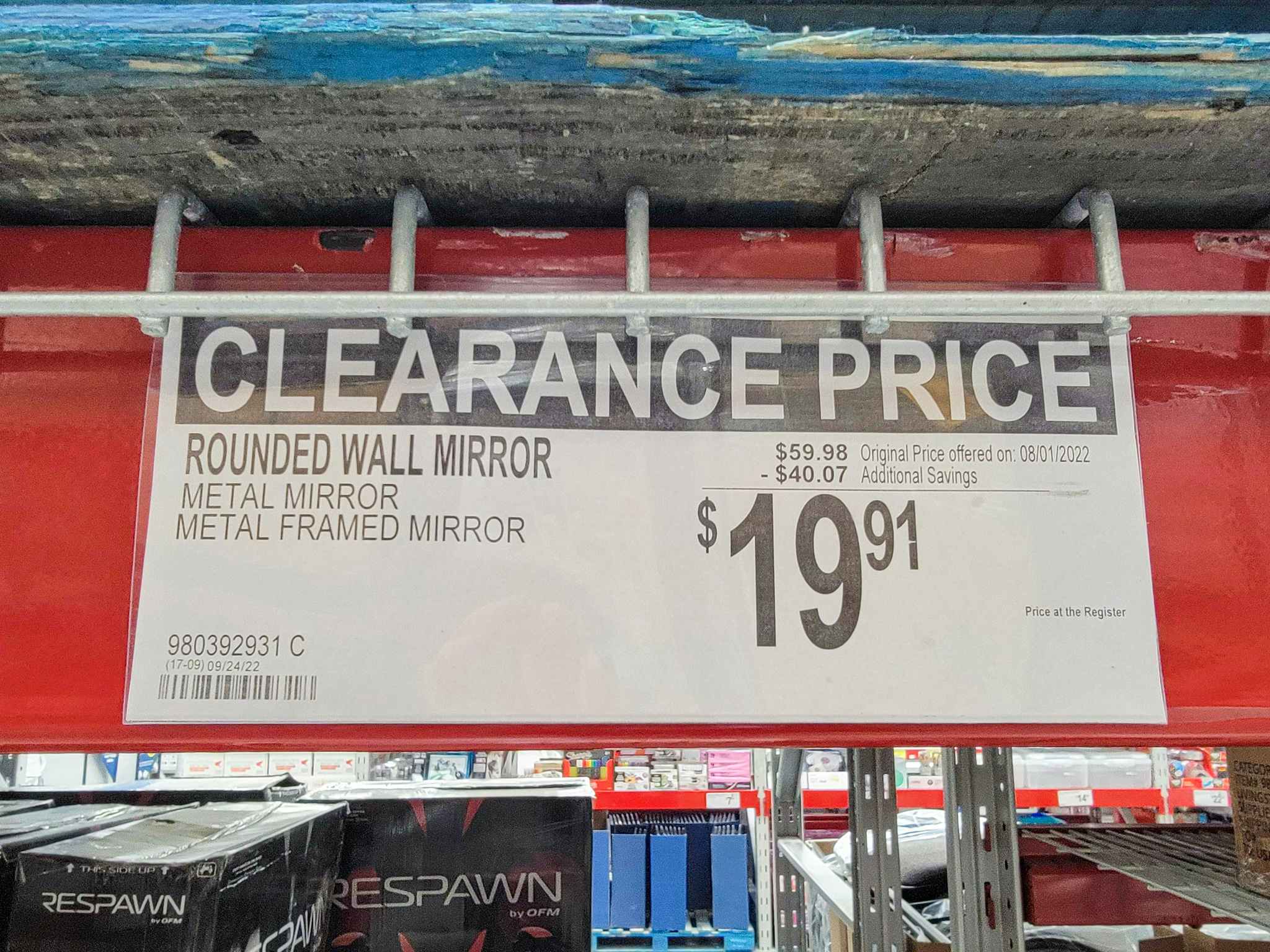 clearance sign for 19.91 gold framed metal wall mirror