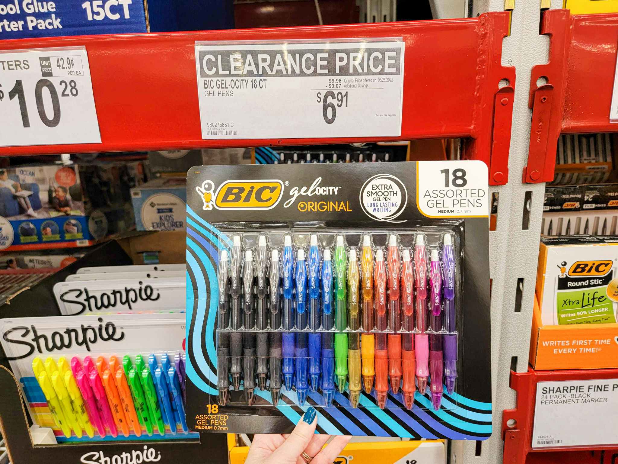 hand holding a pack of 18 bic gelocity pens