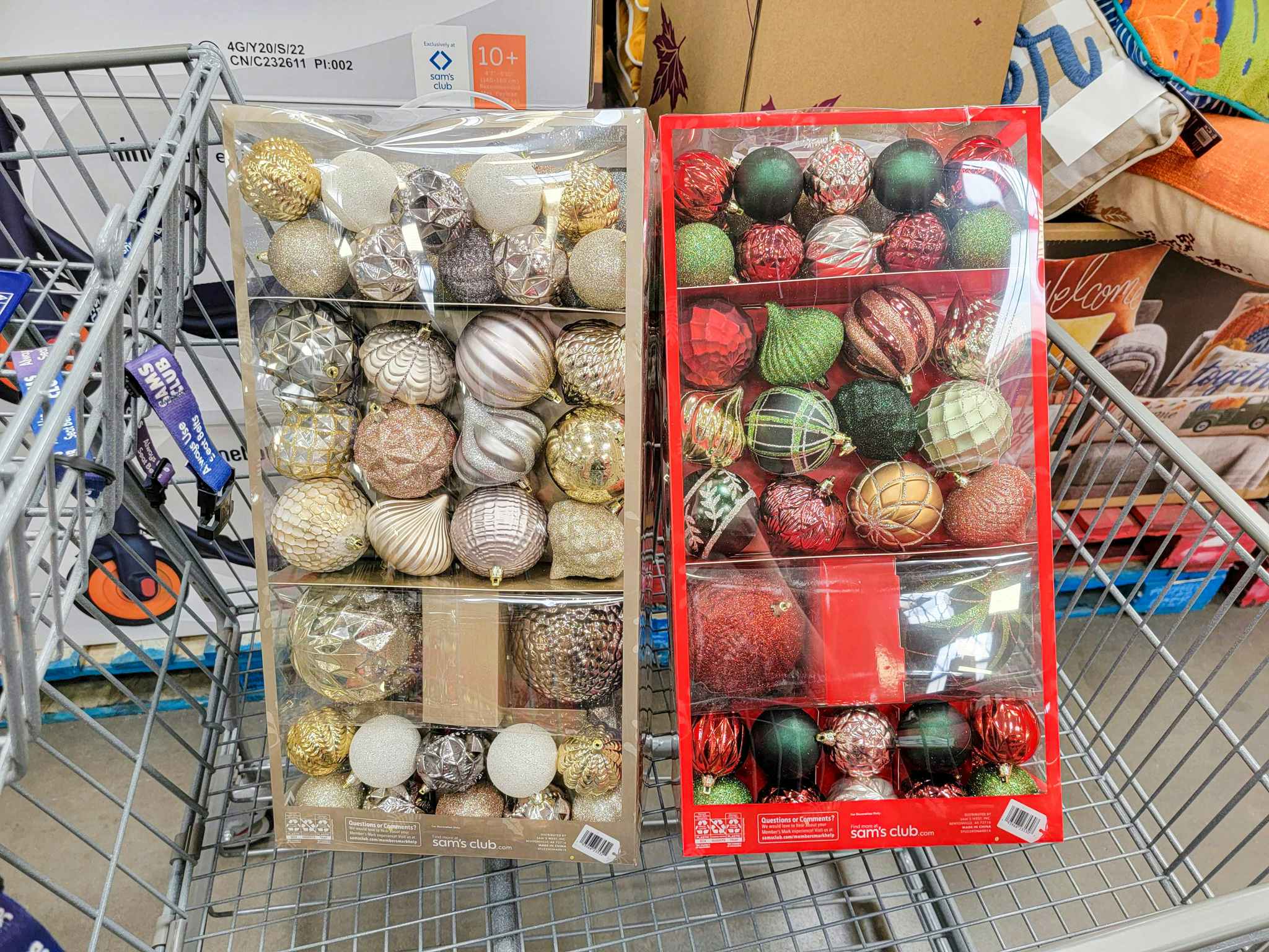 2 huge packs of christmas tree ornaments in a cart