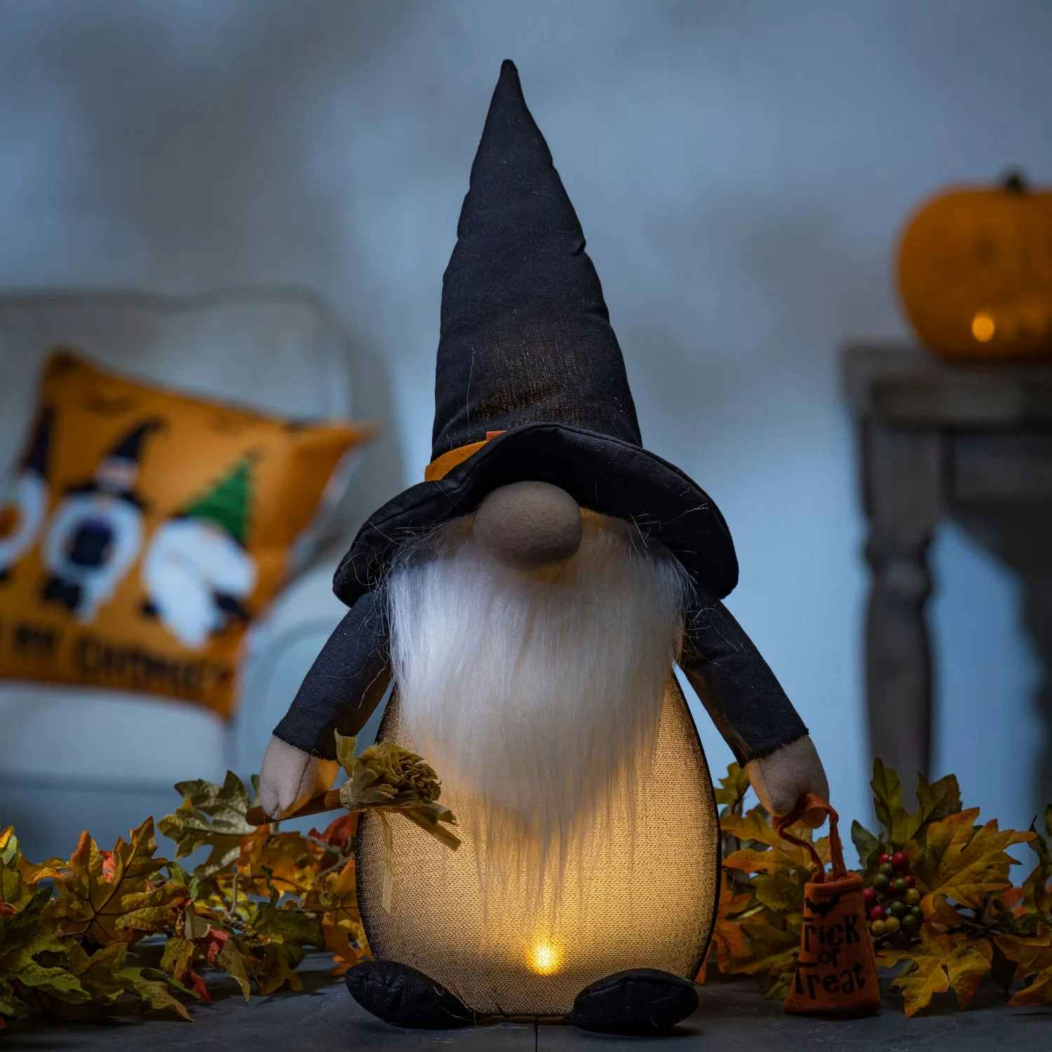a pre lit halloween witch gnome decoration