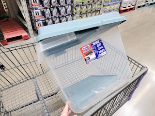 a 72 quart storage tote in a cart