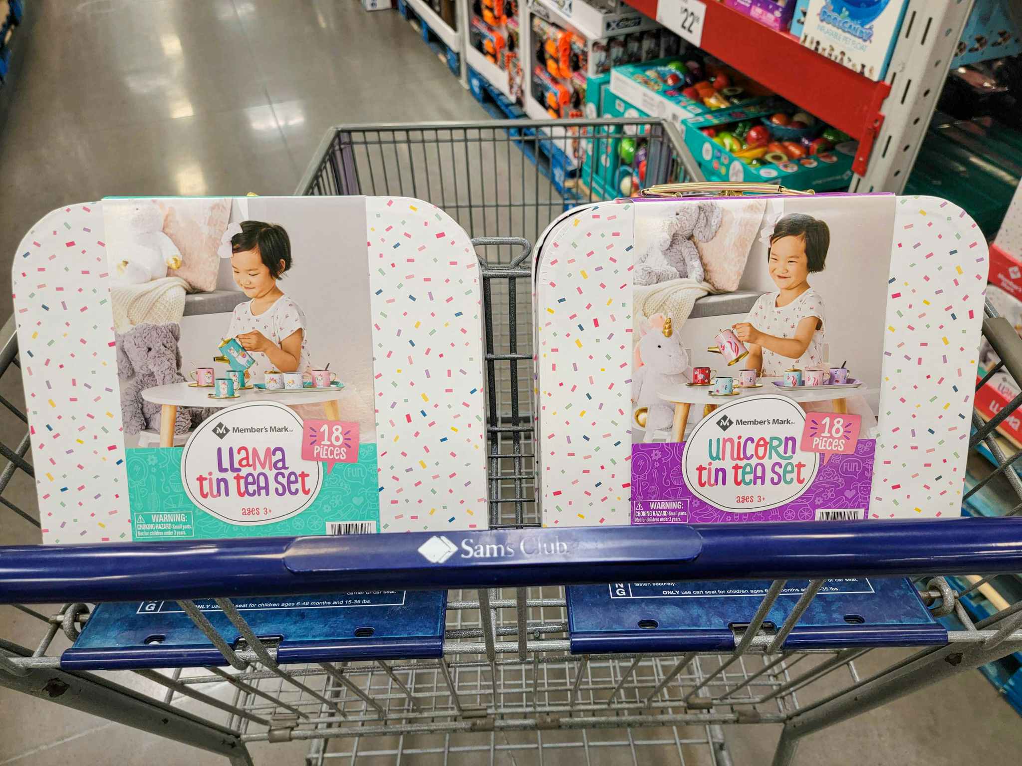 llama and unicorn kids tea sets in a cart