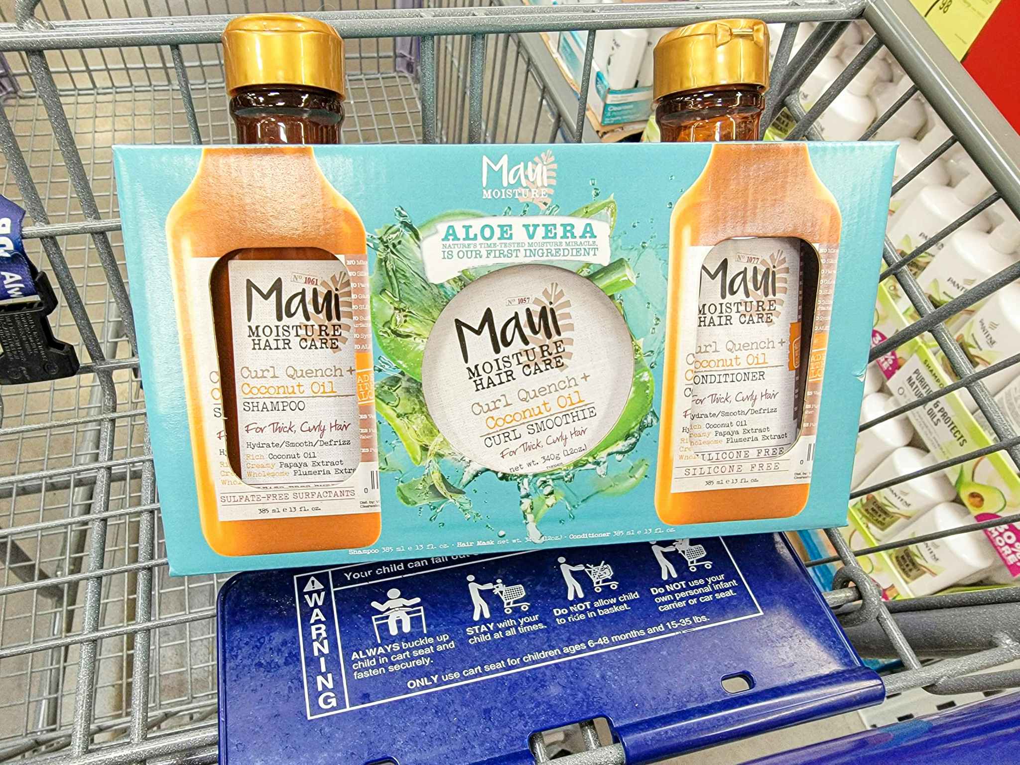 a maui hair care set in a cart, containing shampoo, conditioner, and curl cream