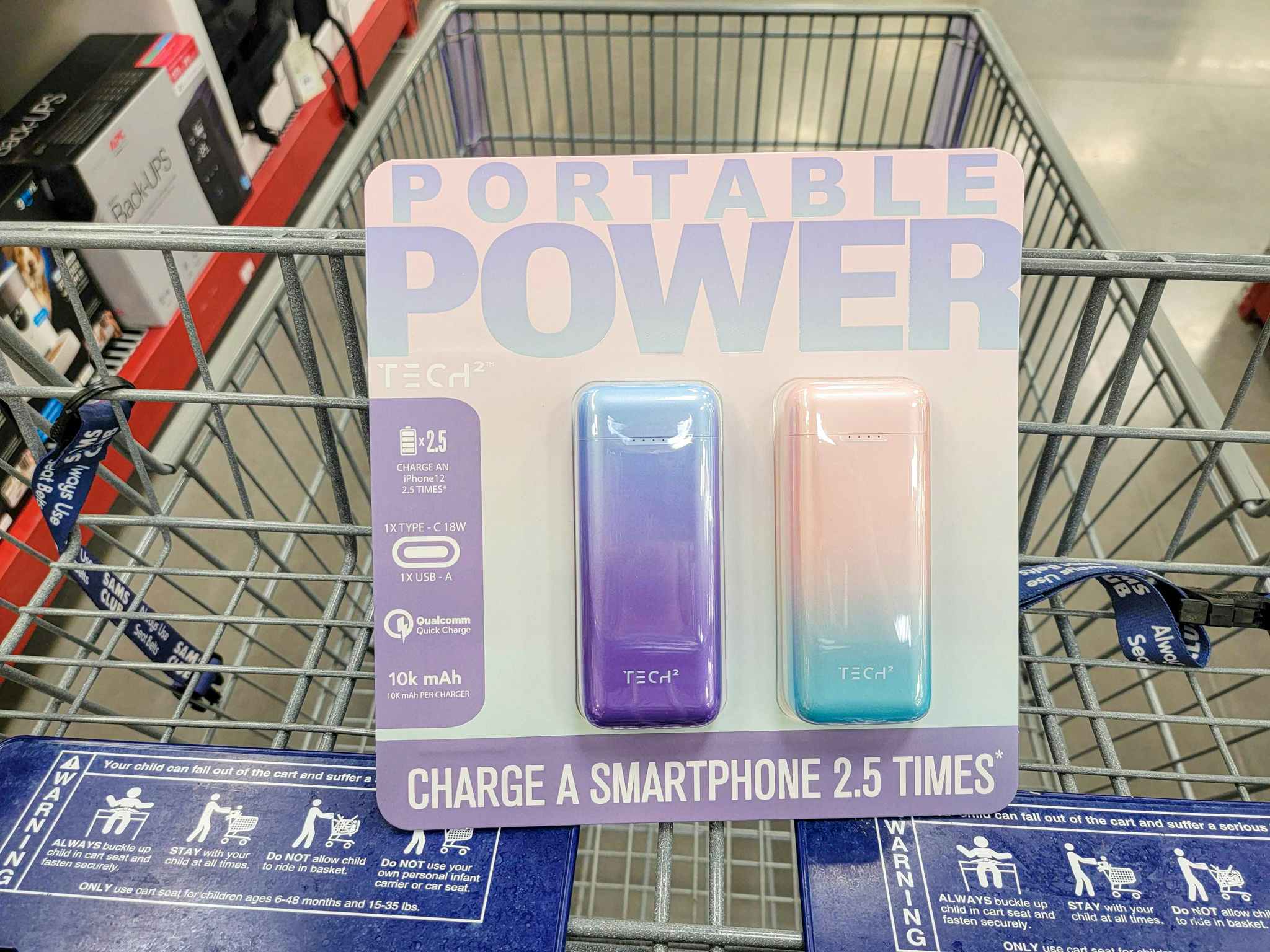 2 ombre colored portable power banks in a cart