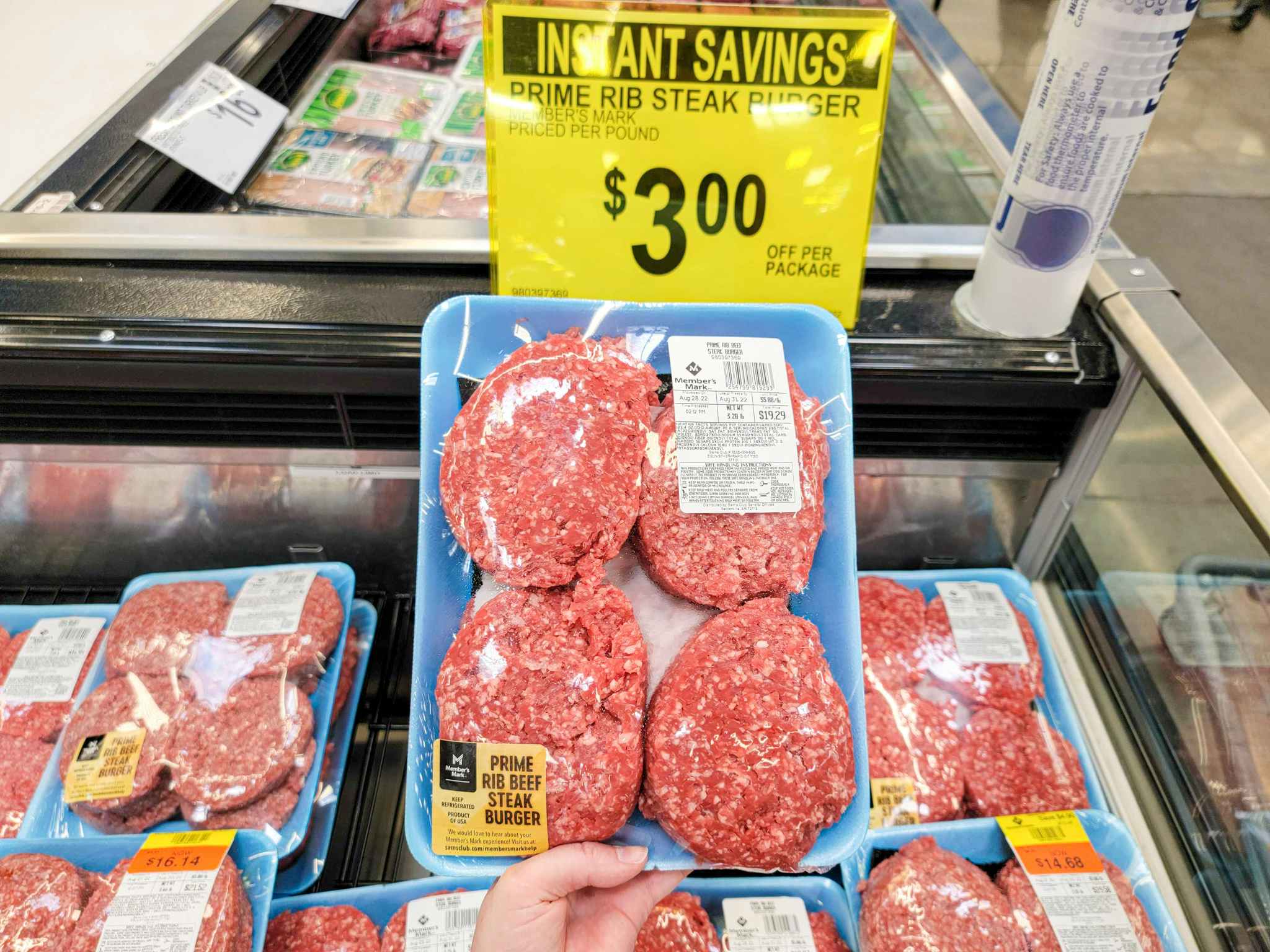 prime rib steak burgers with a sign for $3 off per pack