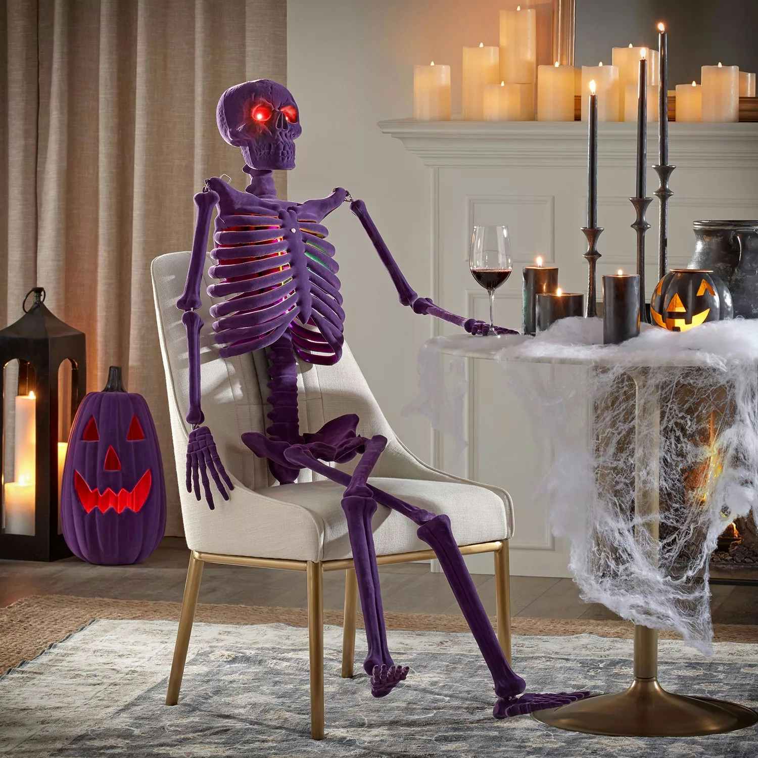 a 6 foot purple skeleton in a chair