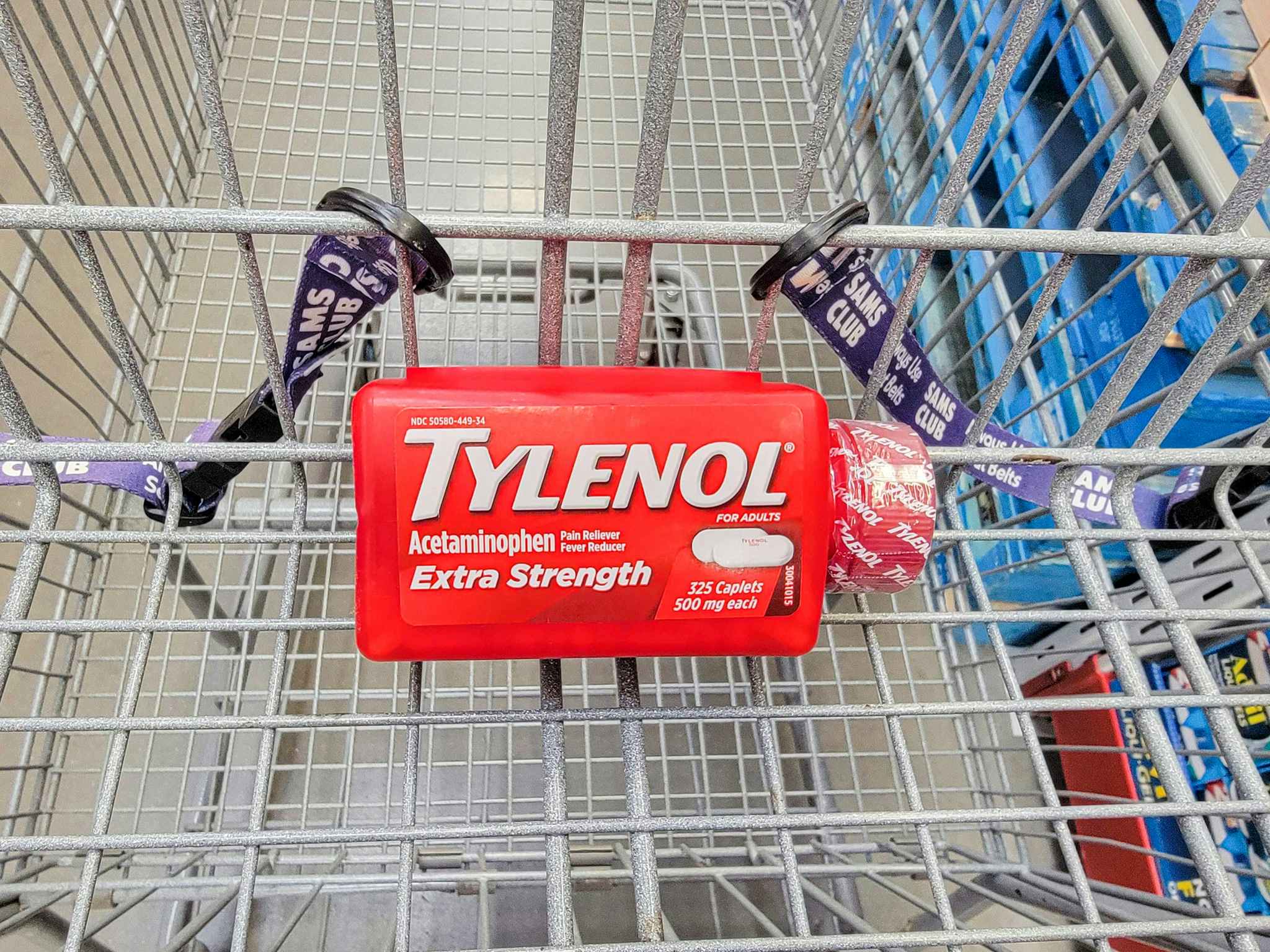 a bottle of 325 tylenol extra strength tabs in a cart