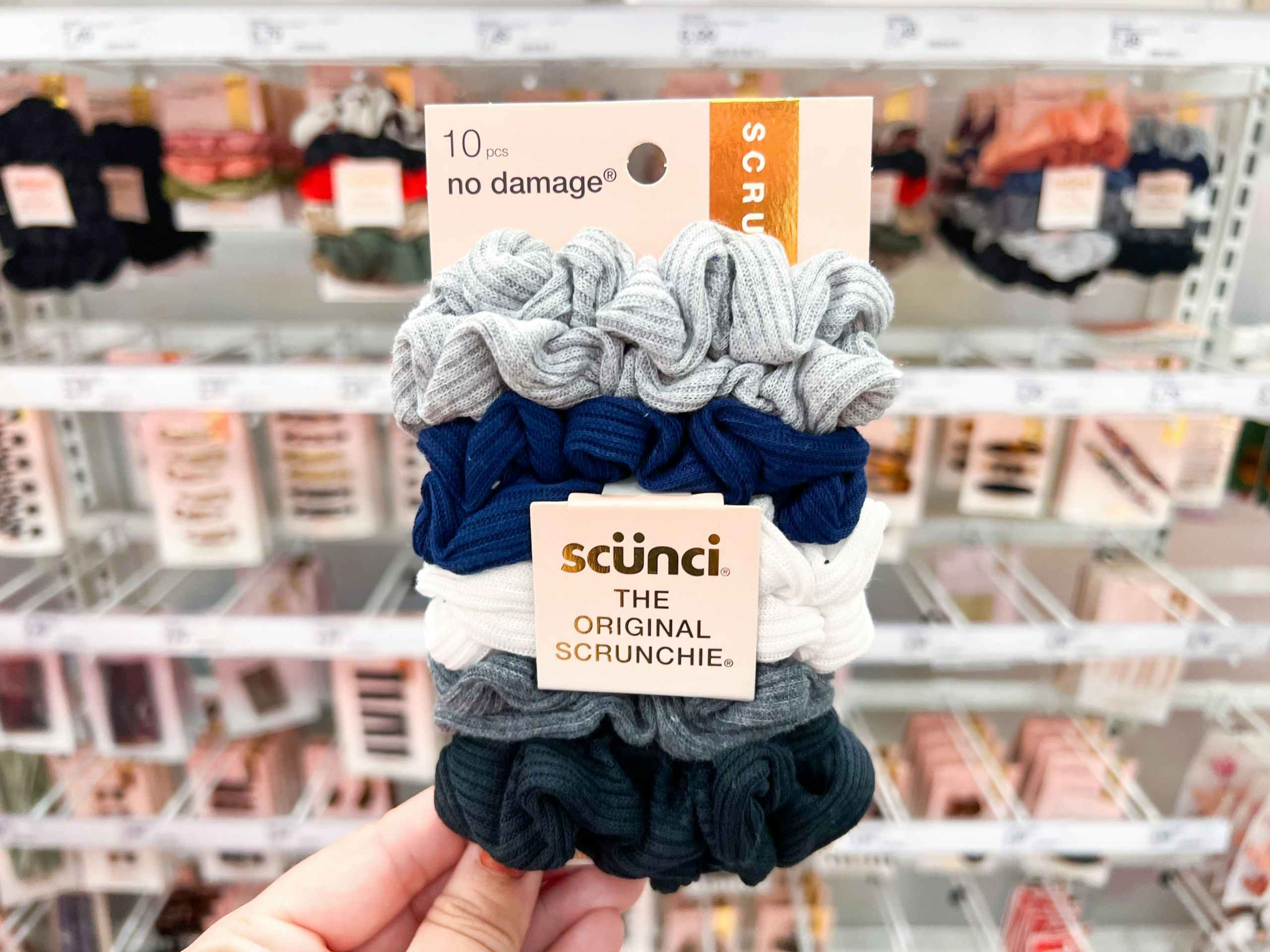 hand holding scunci scrunchies at target