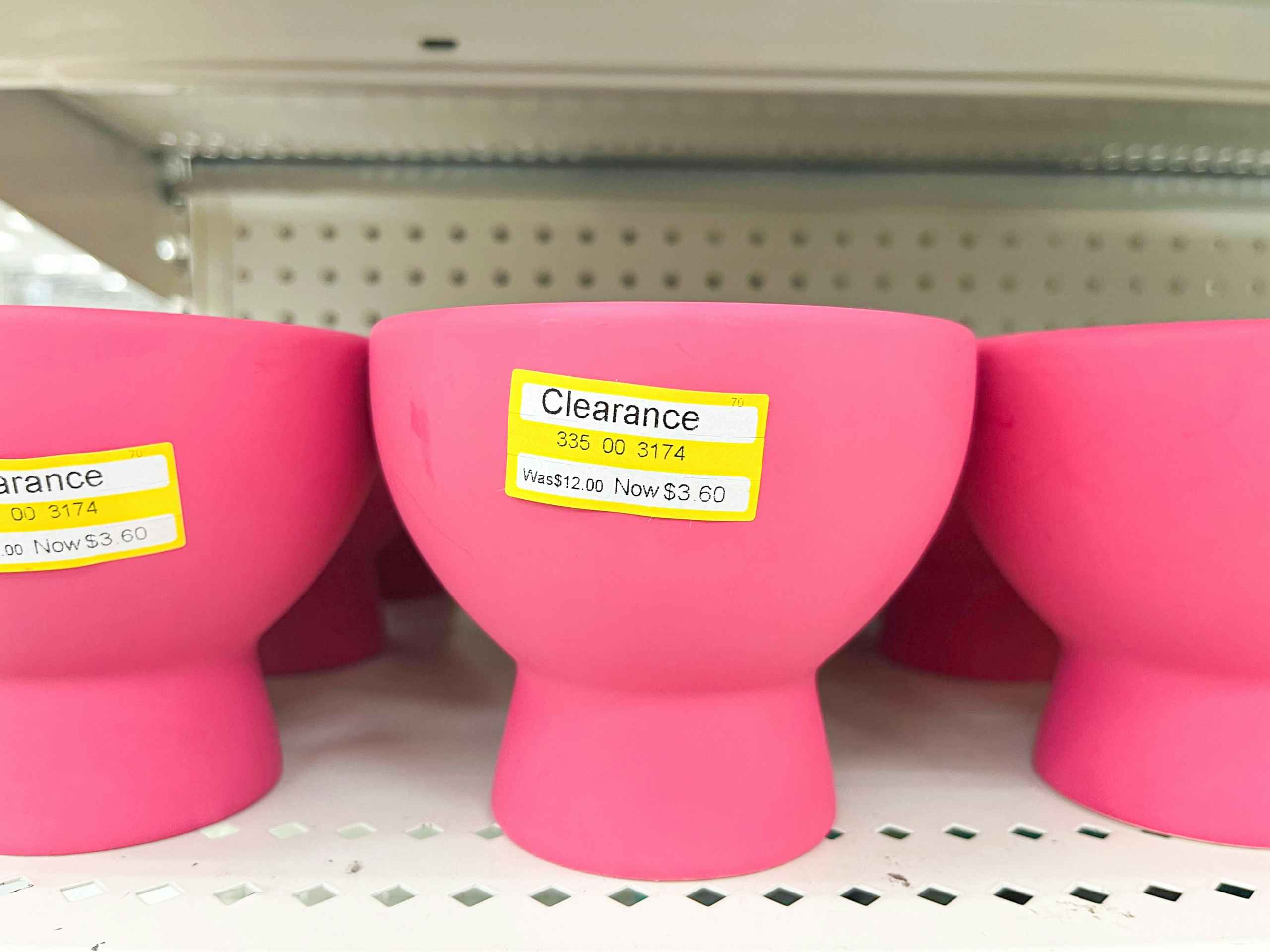 pink candle on shelf