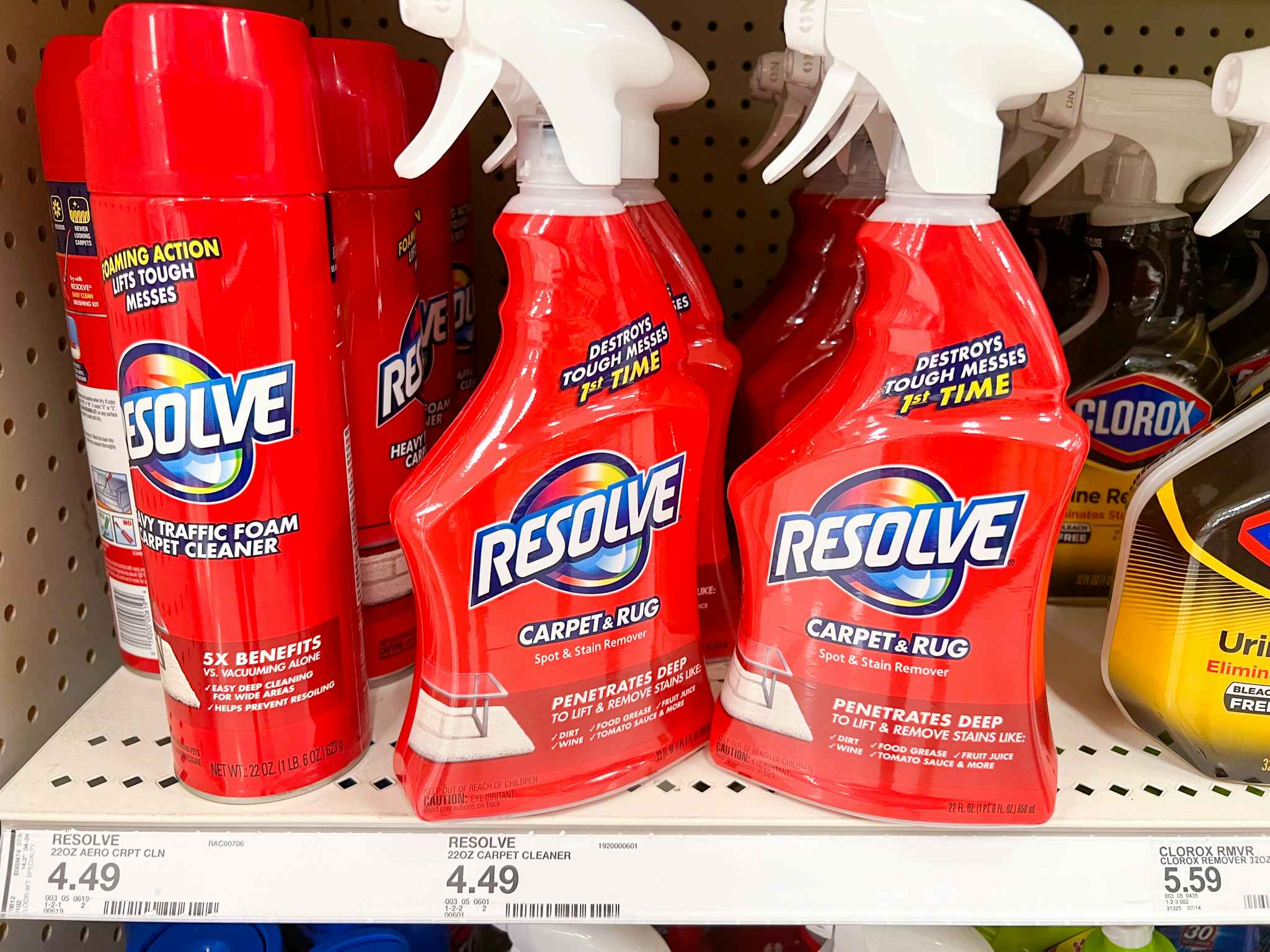 Bottle of Resolve Stain Remover on a shelf at Target with a price tag of $4.49