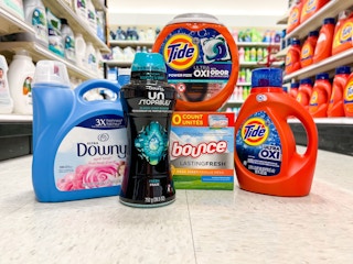 tide, downly, and bounce laundry products in a target aisle