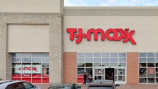 woman pushing stroller into tj maxx store