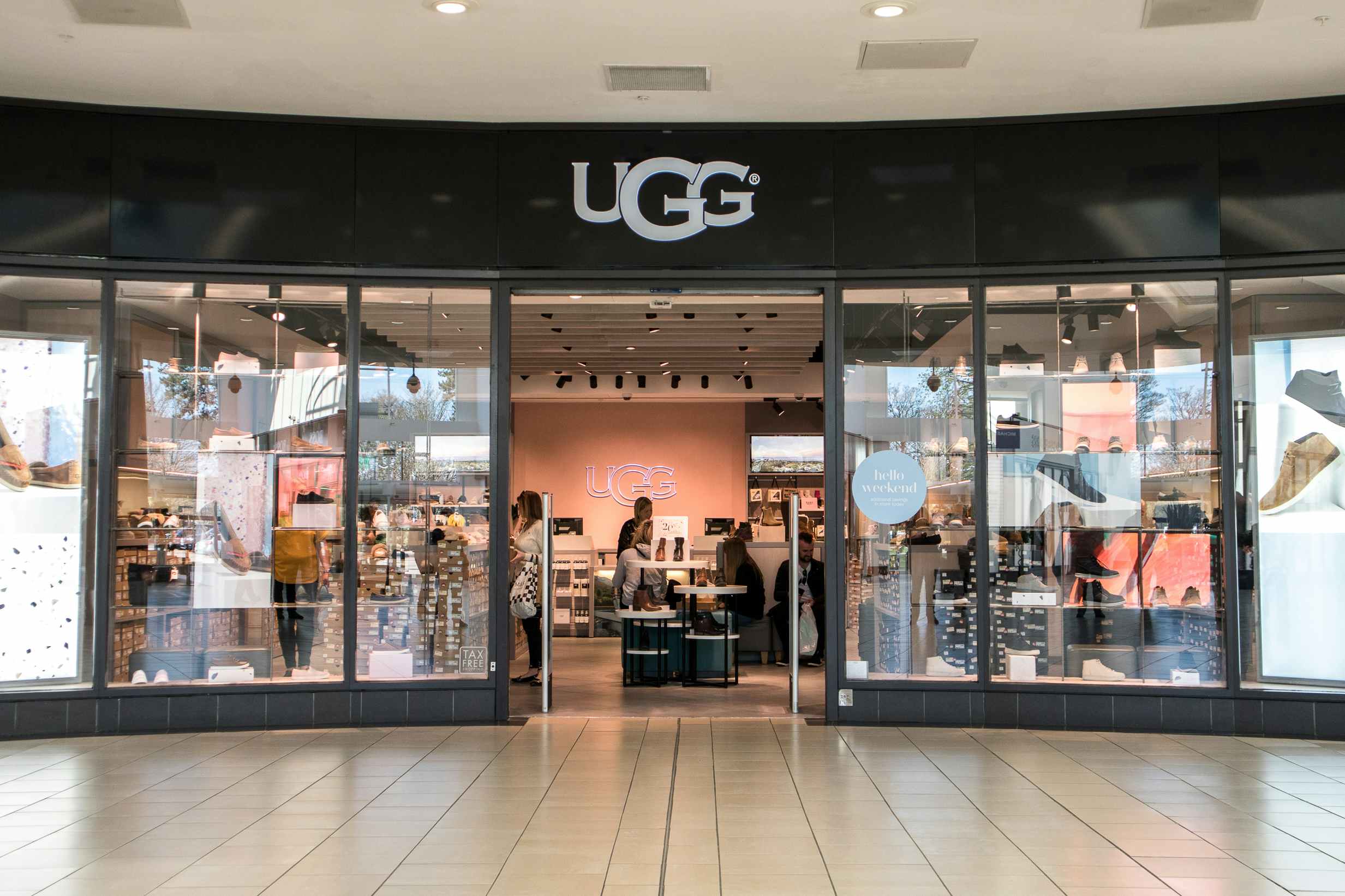 An UGG store entrance inside a mall.