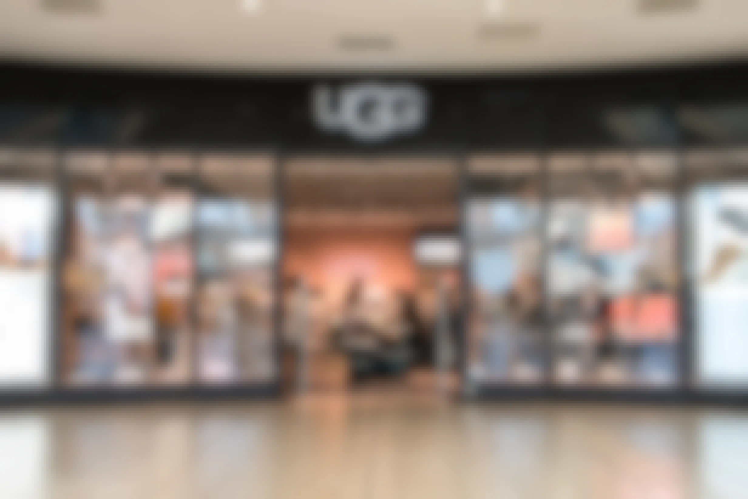 An UGG store entrance inside a mall.