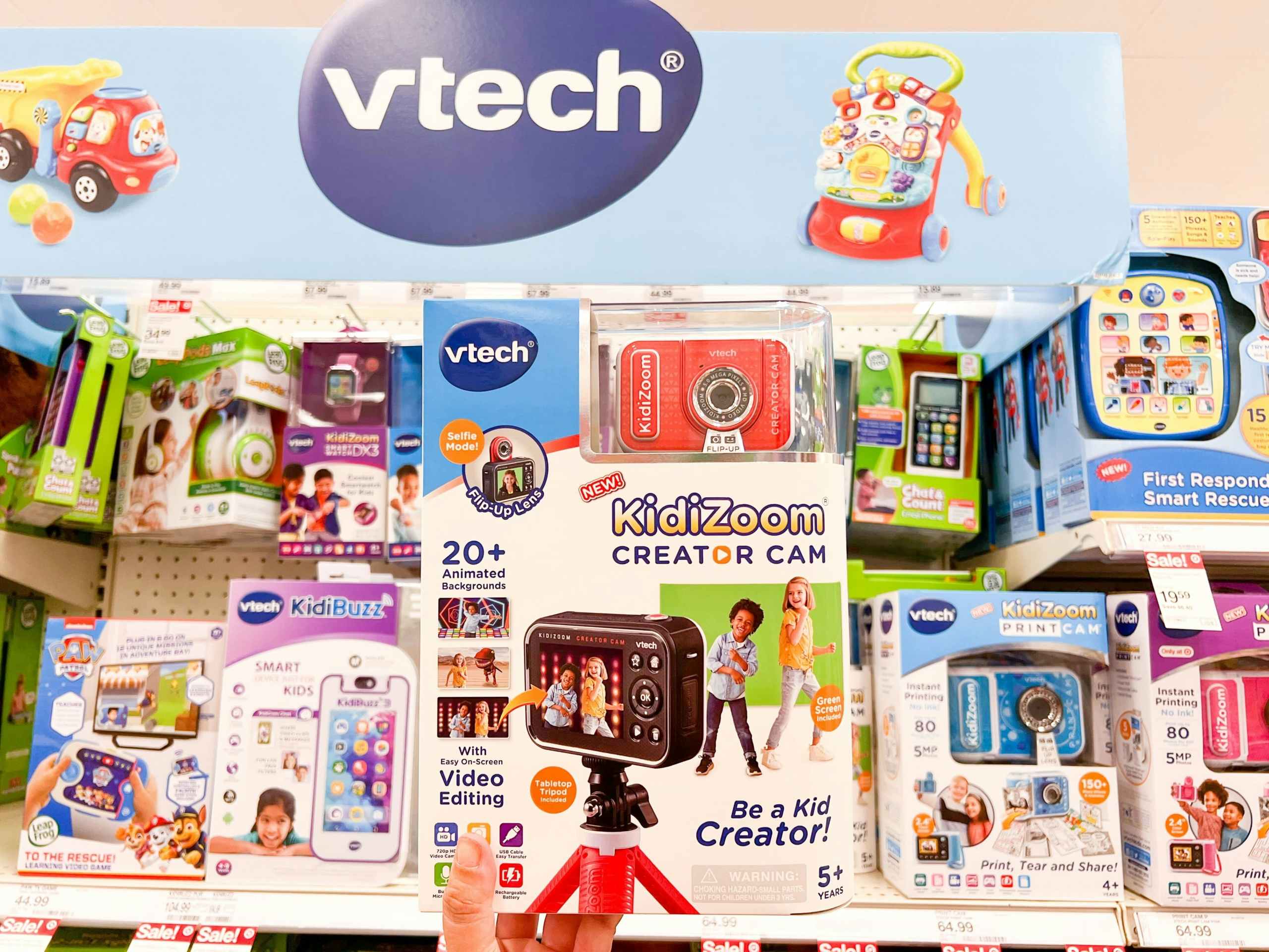 hand holding a vtech kidizoom creator cam at target