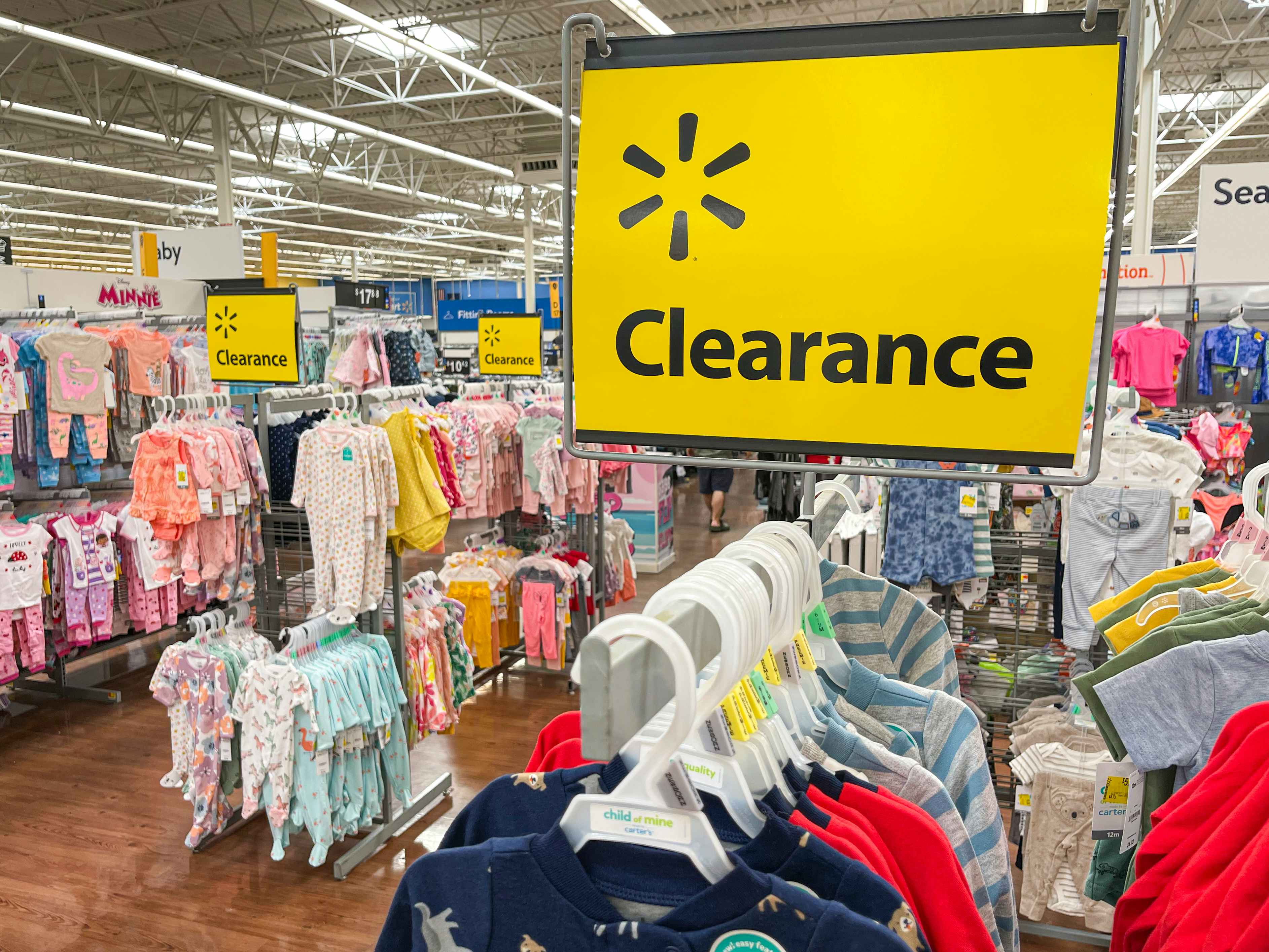 A clearance sign in the clearance section for kids pajamas