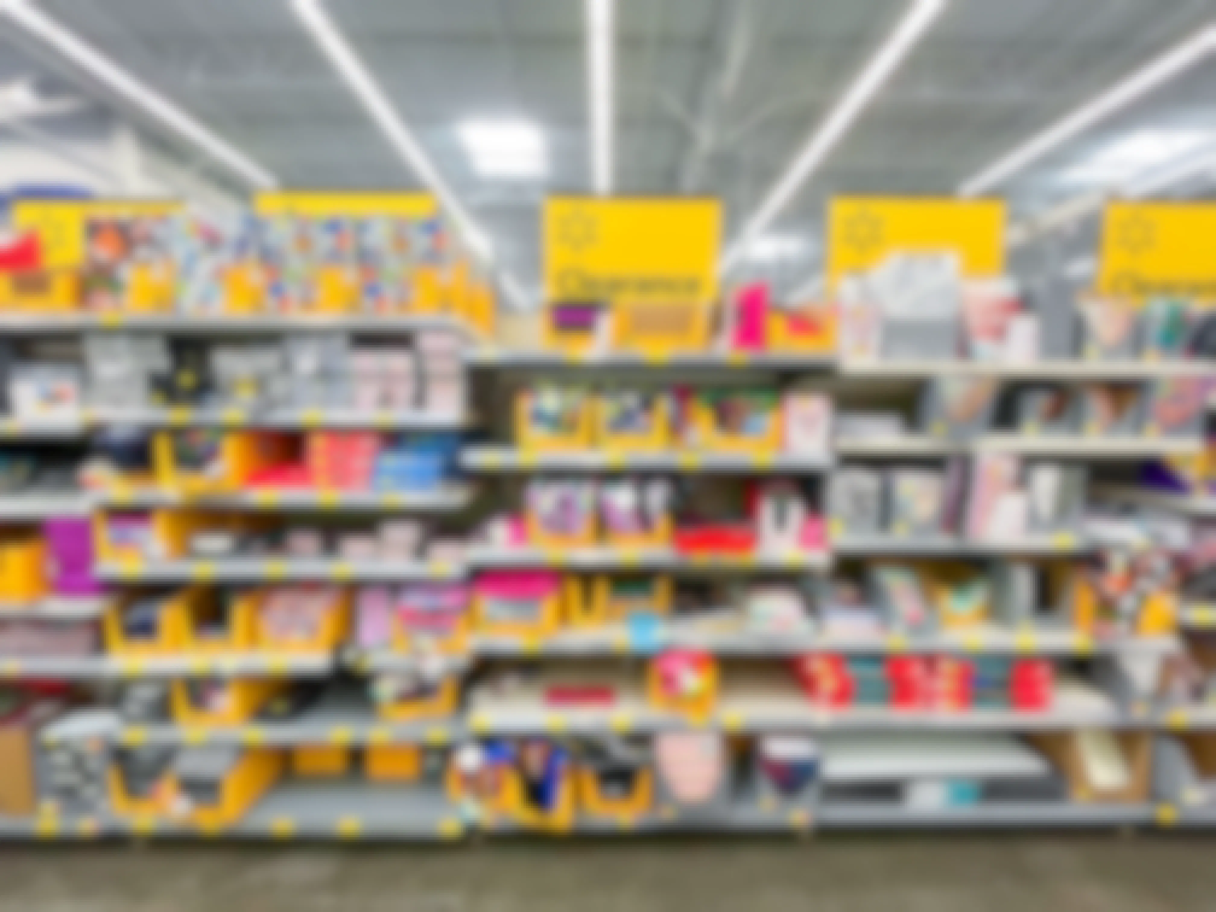 A walmart back-to-school clearance shelf filled with school supplies in store