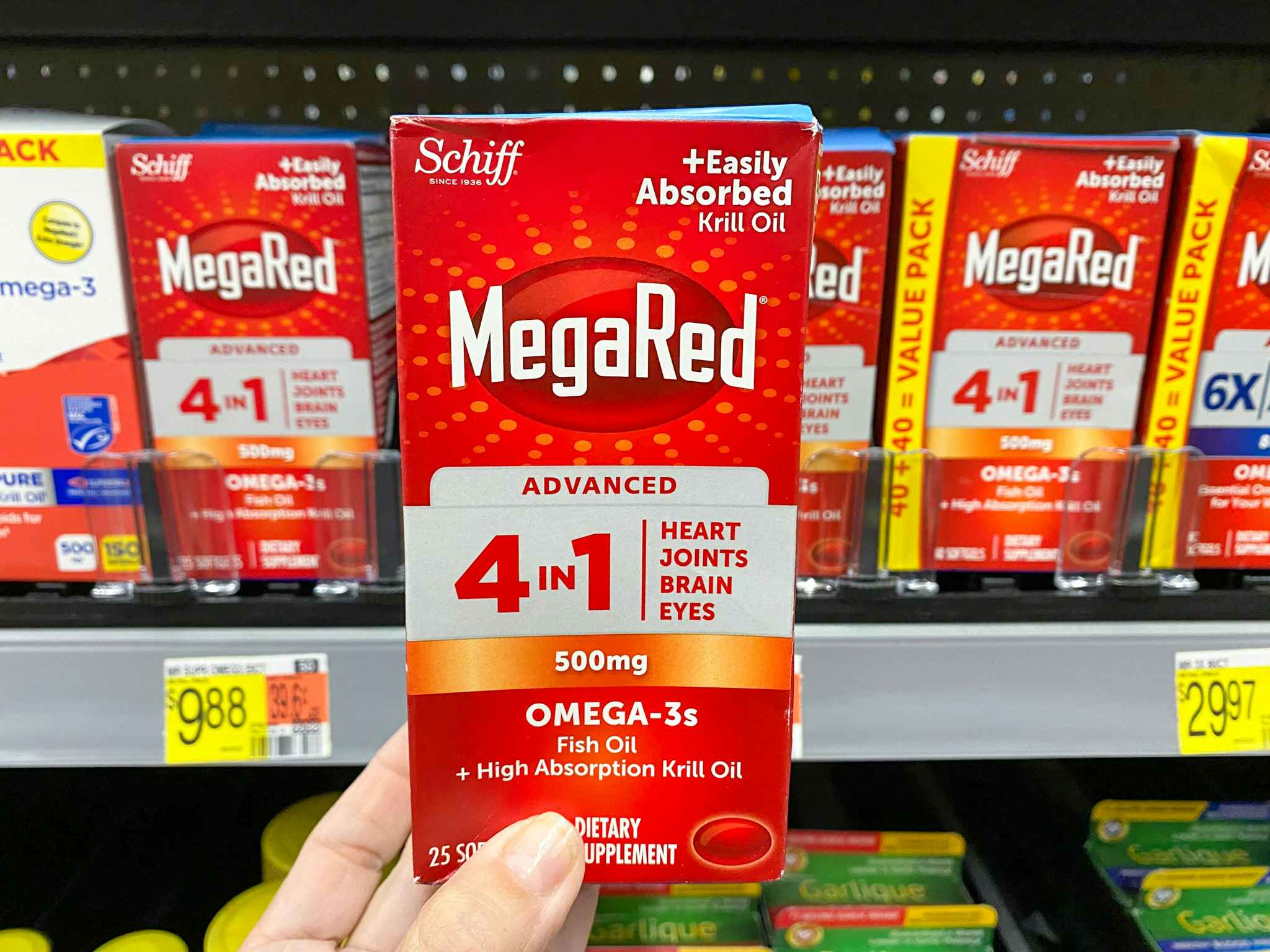 hand holding megared advanced at walmart