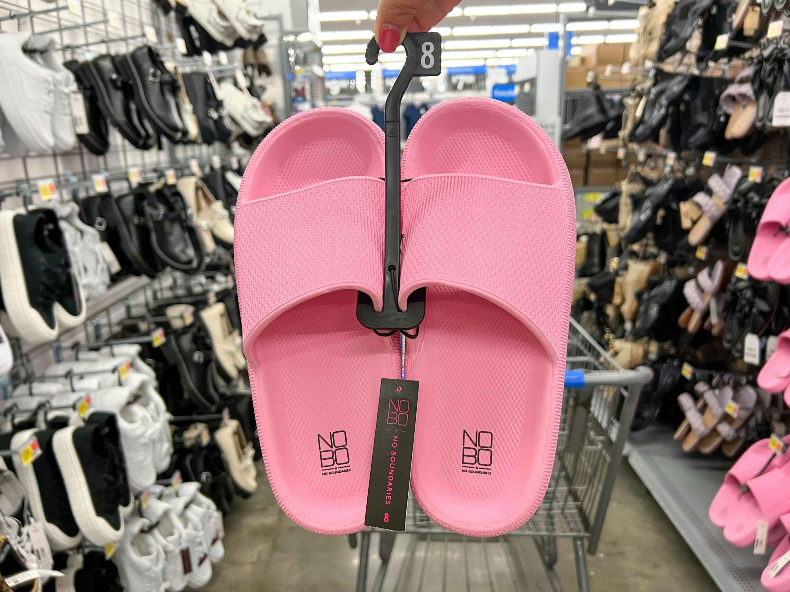 hand holding no boundaries comfort slides at walmart