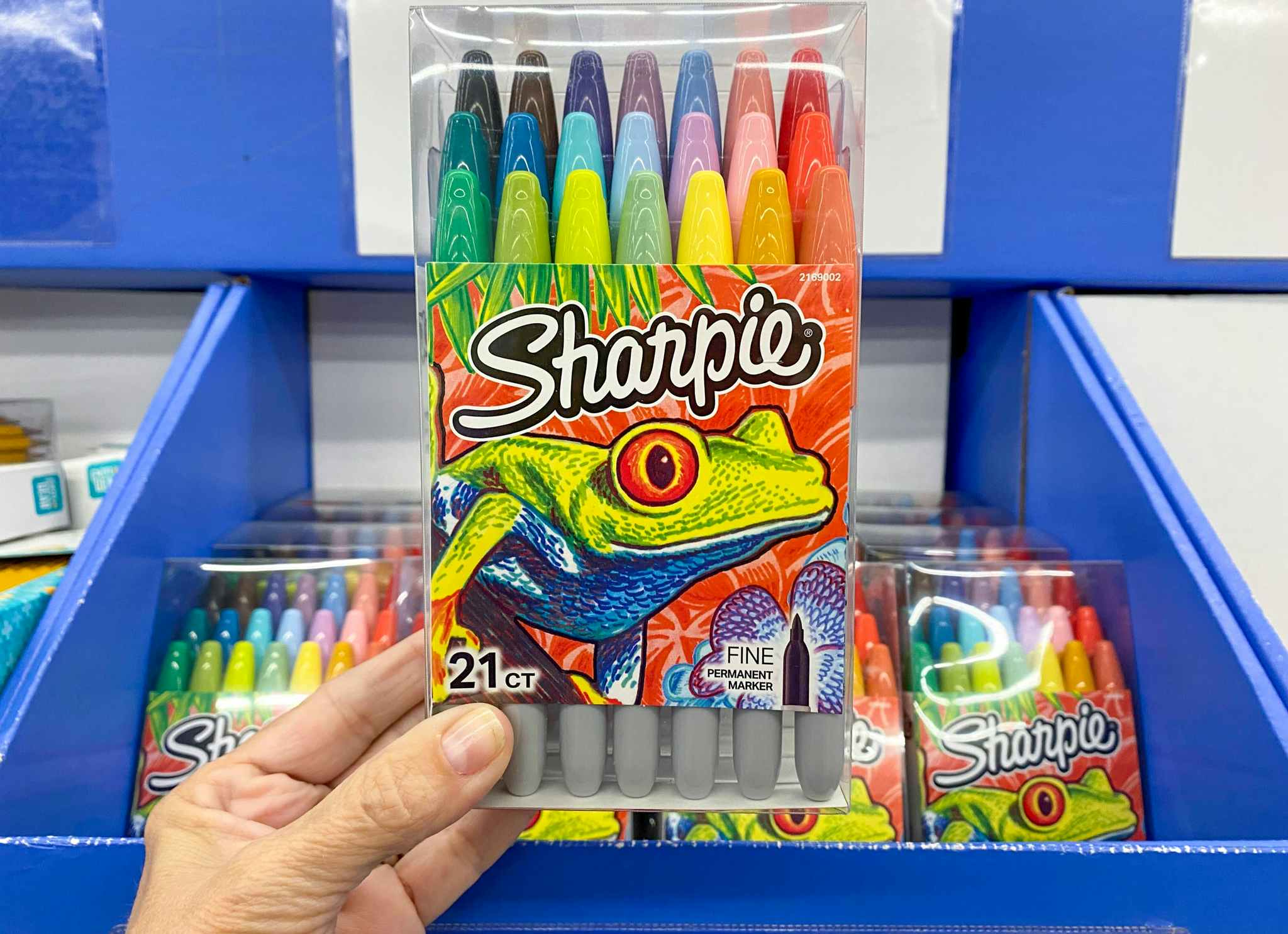 hand holding sharpie markers at walmart