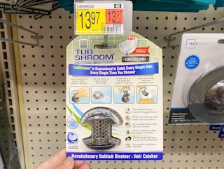 hand holding tubshroom bathtub strainer at walmart
