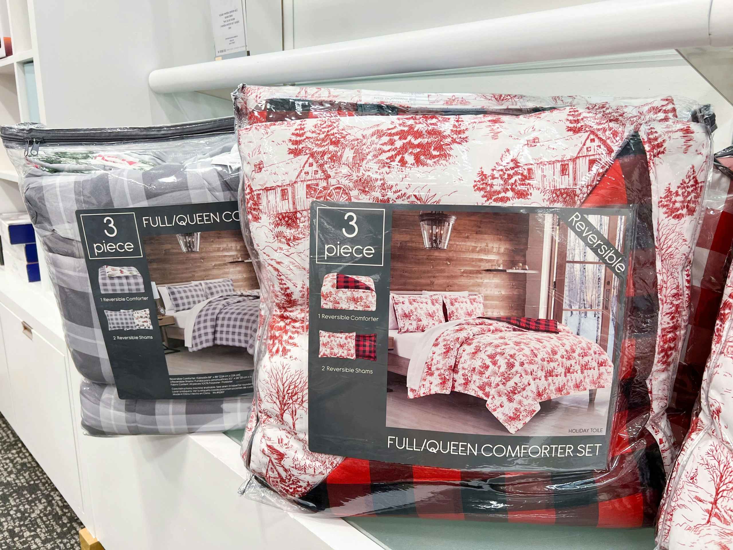 3-piece comforter sets on a shelf in macys