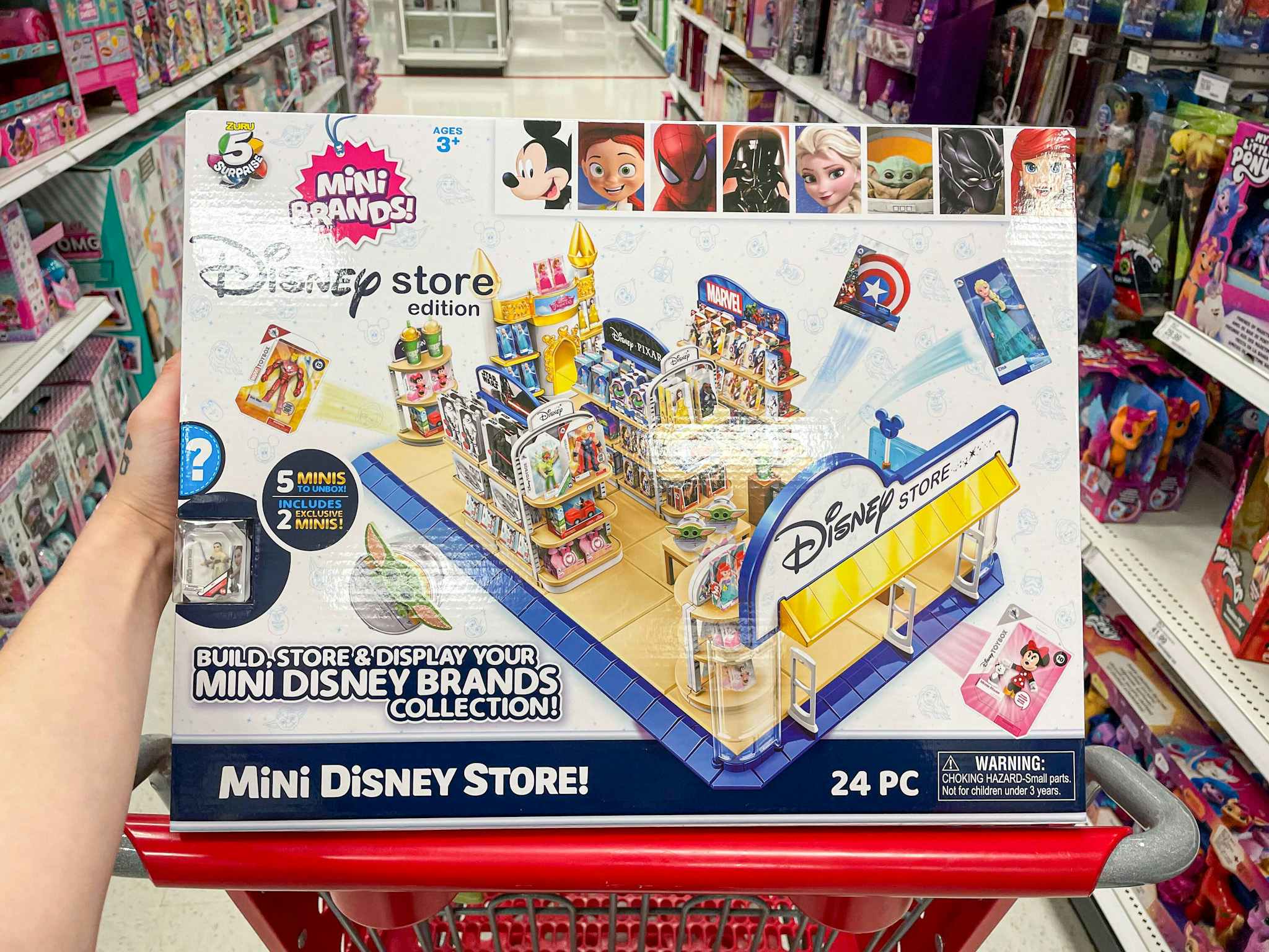 5 surprise mini brands disney store on a target cart