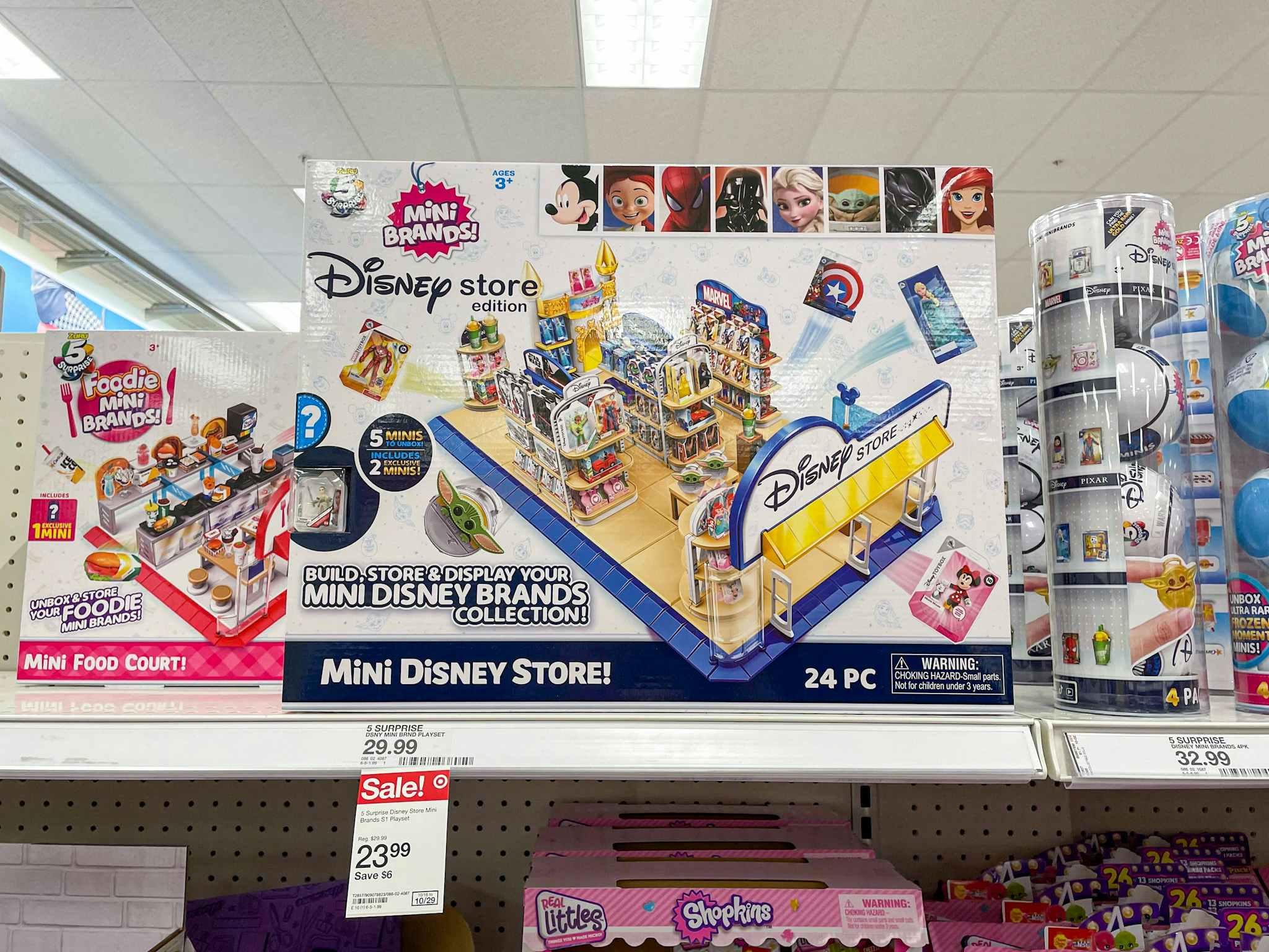 5 surprise mini brands disney store on a target shelf