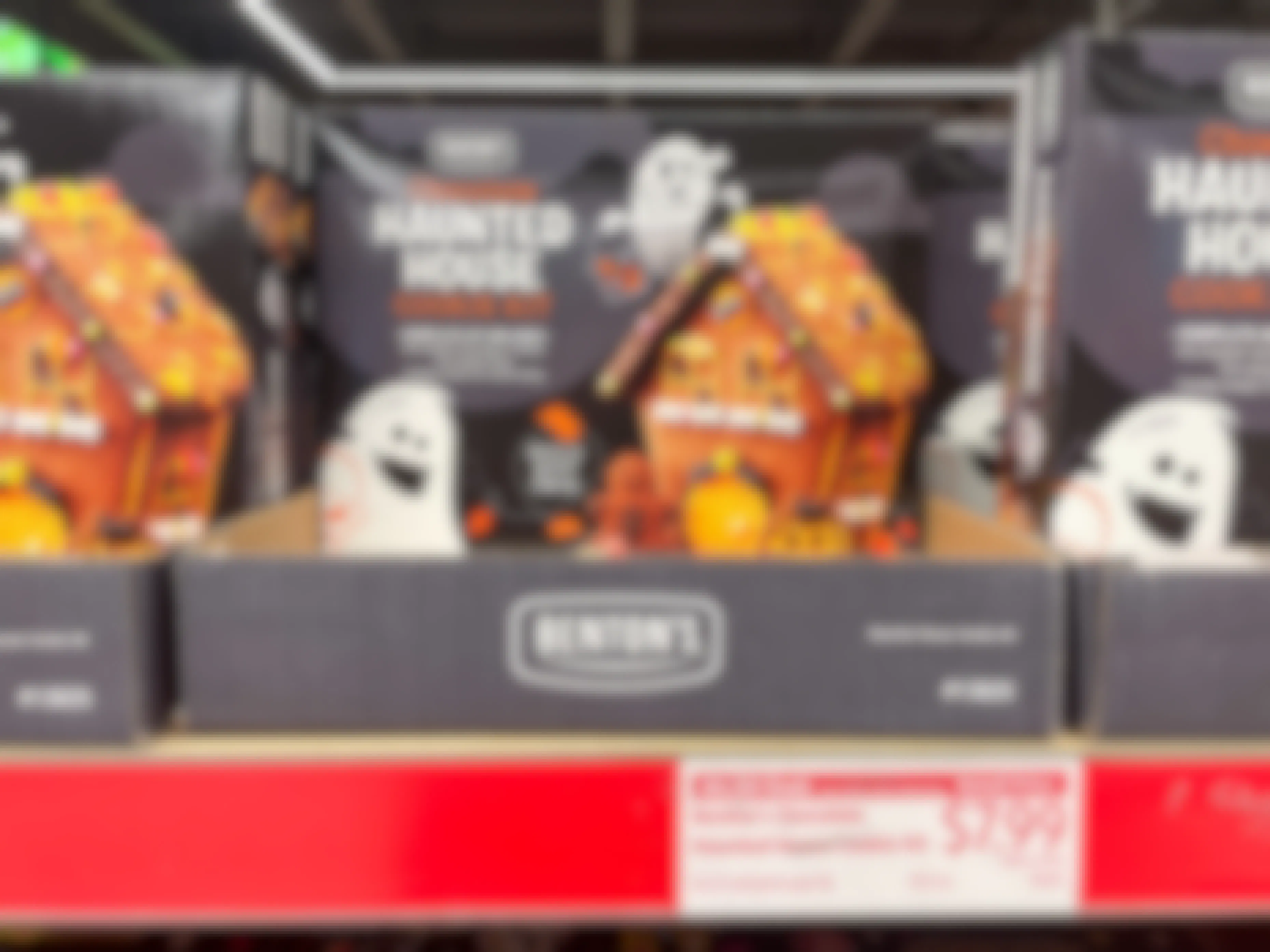 A Halloween chocolate cookie haunted house kit on a shelf at Aldi.