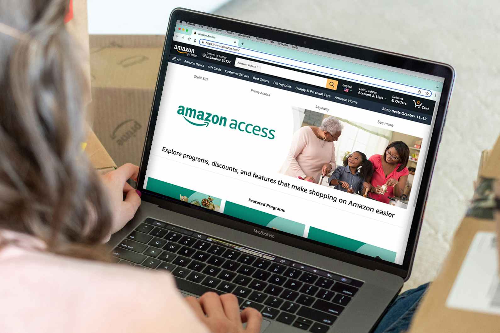 person on laptop looking at amazon access landing page