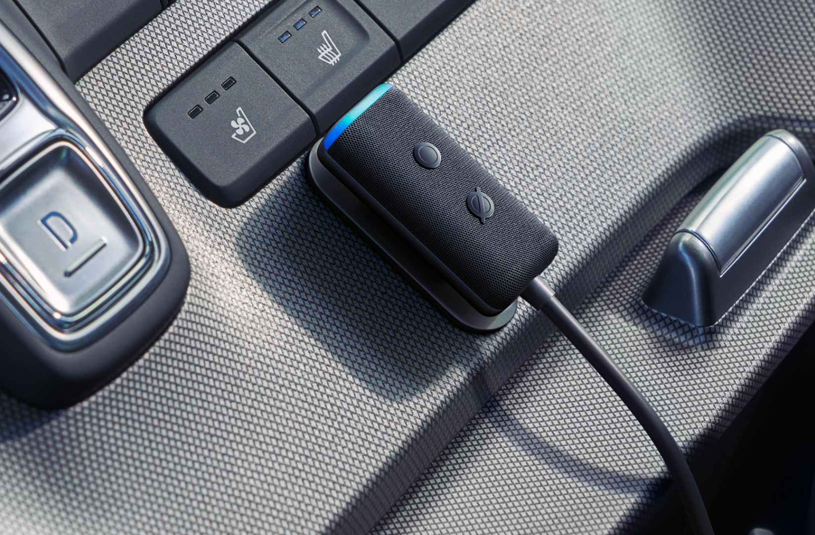 A 2nd Gen Echo Auto mounted in a vehicle.