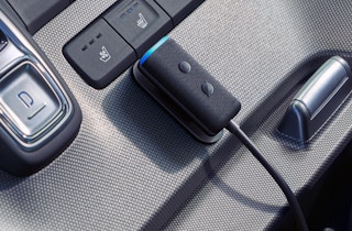 A 2nd Gen Echo Auto mounted in a vehicle.
