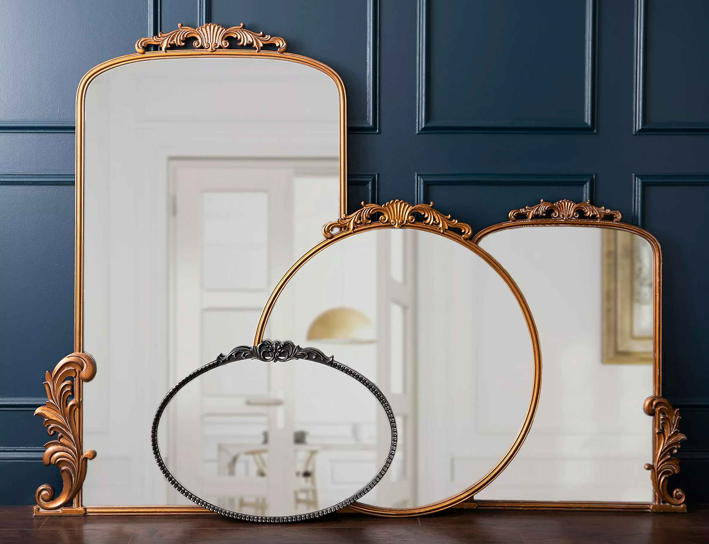 Gold Bordeaux Ornate Mirrors from Kirkland's Home leaning on a wall