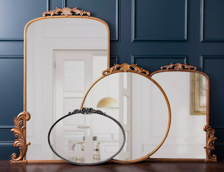 Gold Bordeaux Ornate Mirrors from Kirkland's Home leaning on a wall