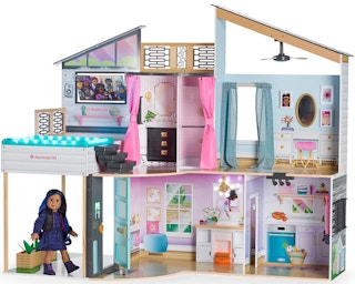 An American Girl x KidKraft Luxury Dollhouse on a white background