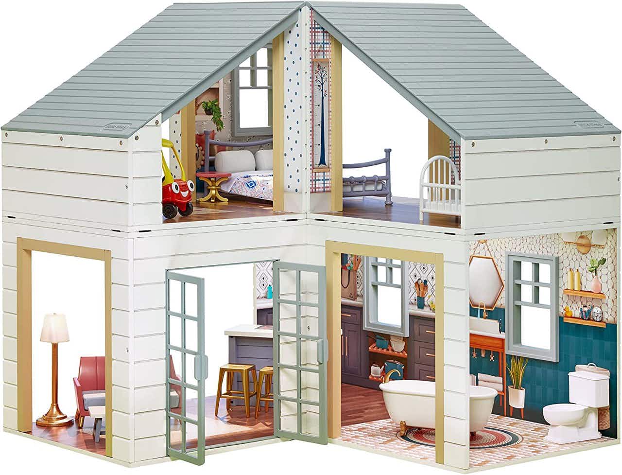 A Little Tikes Real Wood Stack 'n Style Dollhouse on a white background